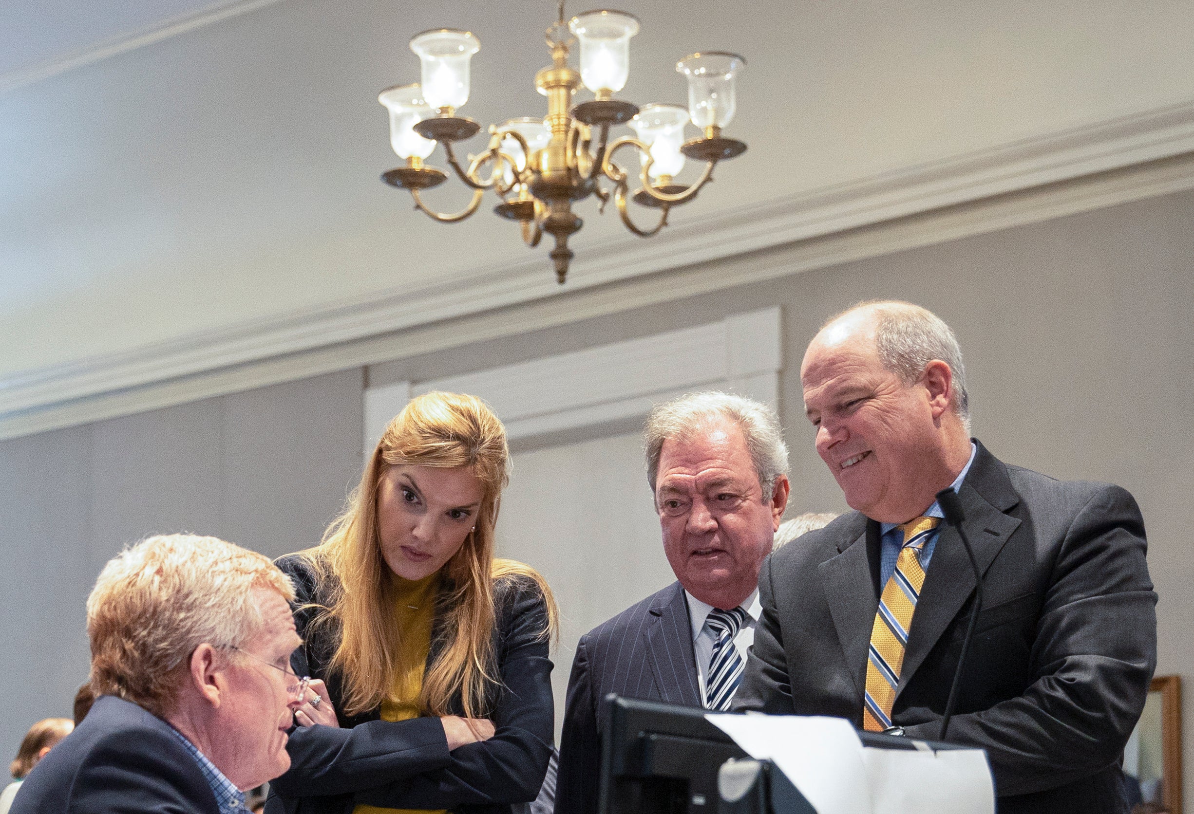 Alex Murdaugh, Maggie Fox, Dick Harpootlian and Jim Griffin talk while on a break during the trial