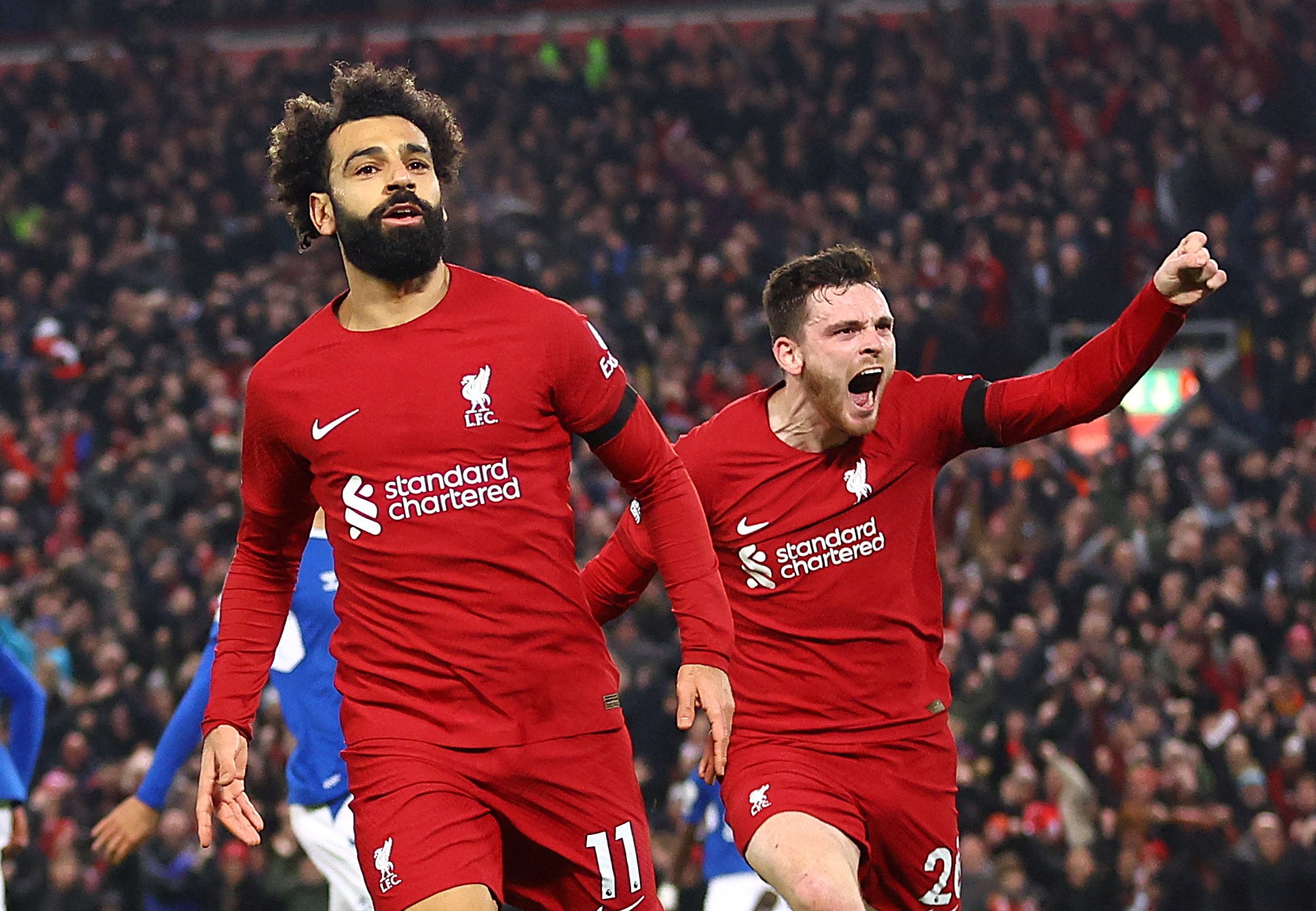 Mohamed Salah celebrates after scoring in the Merseyside derby