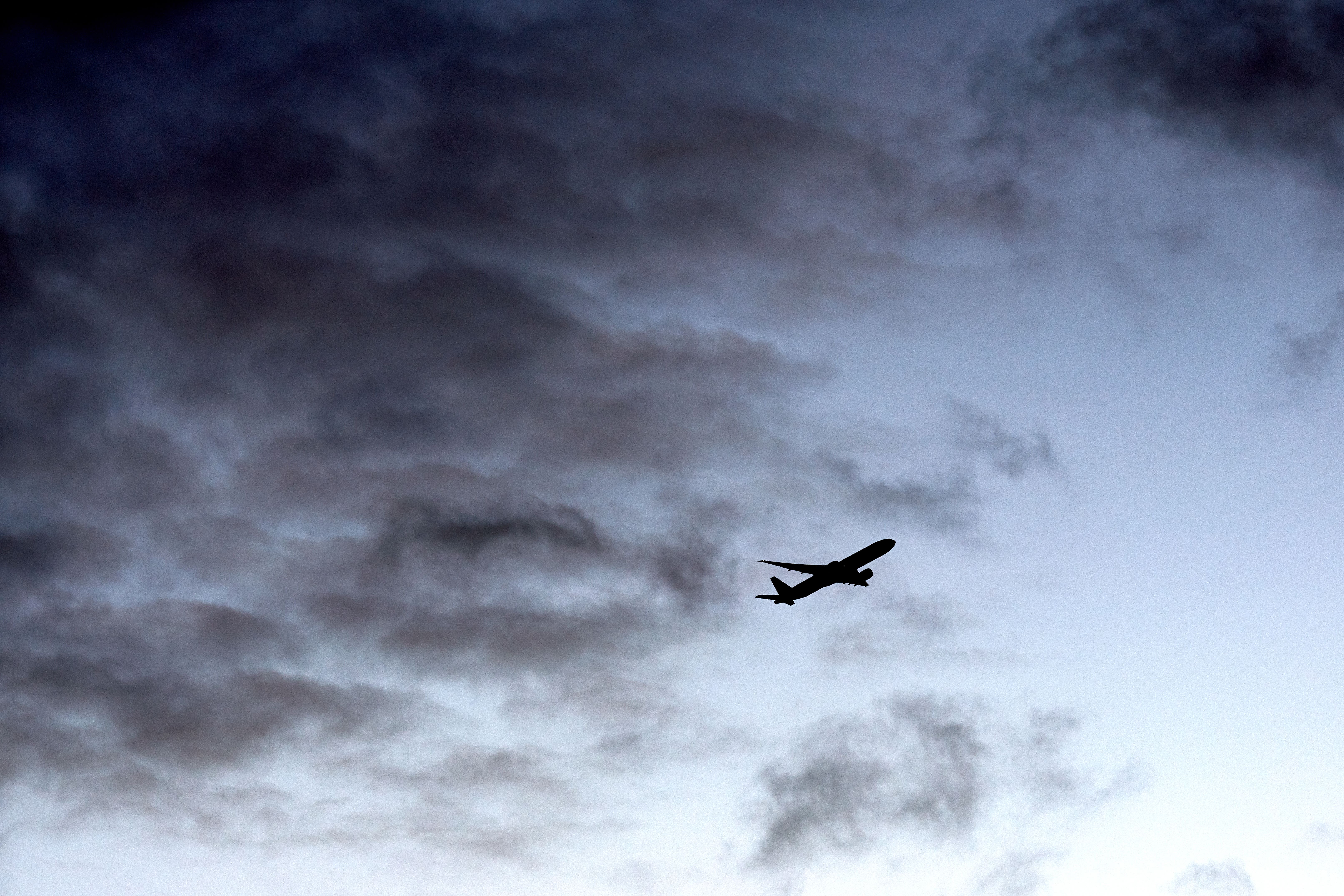 A plane flying through cloud (John Walton/PA)