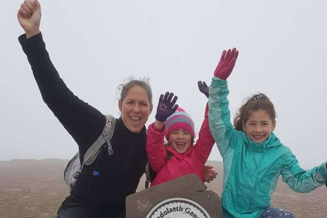 Emma Atcherley with her daughters (FCDO/PA)