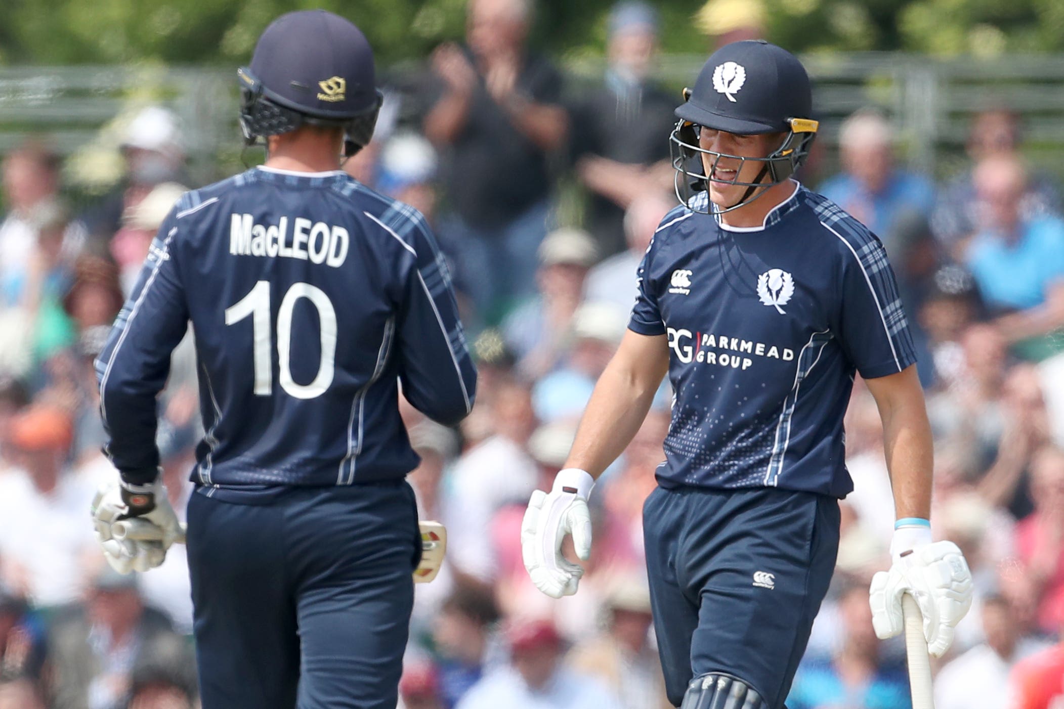 George Munsey (right) scores 103 as Scotland beat Namibia (Jane Barlow/PA)