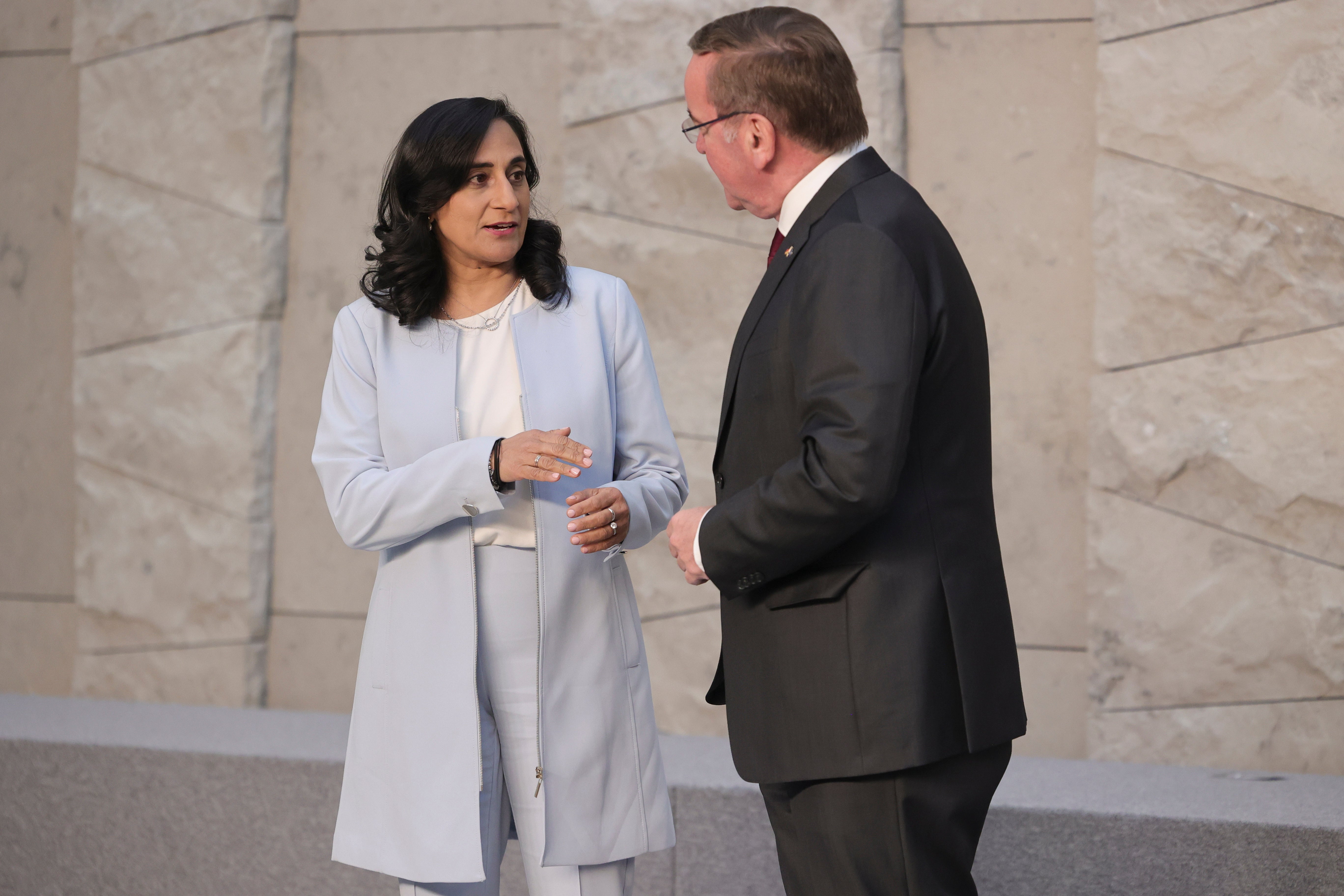 Canada's Defense Minister Anita Anand and Germany's Defense Minister Boris Pistorius talk prior to a group photo of NATO defense ministers at NATO headquarters in Brussels, Wednesday, Feb. 15, 2023. (AP Photo/Olivier Matthys)