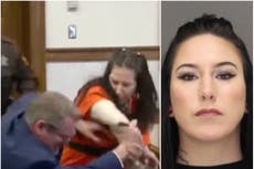 Woman accused of decapitating her lover attacks lawyer in wild court assault