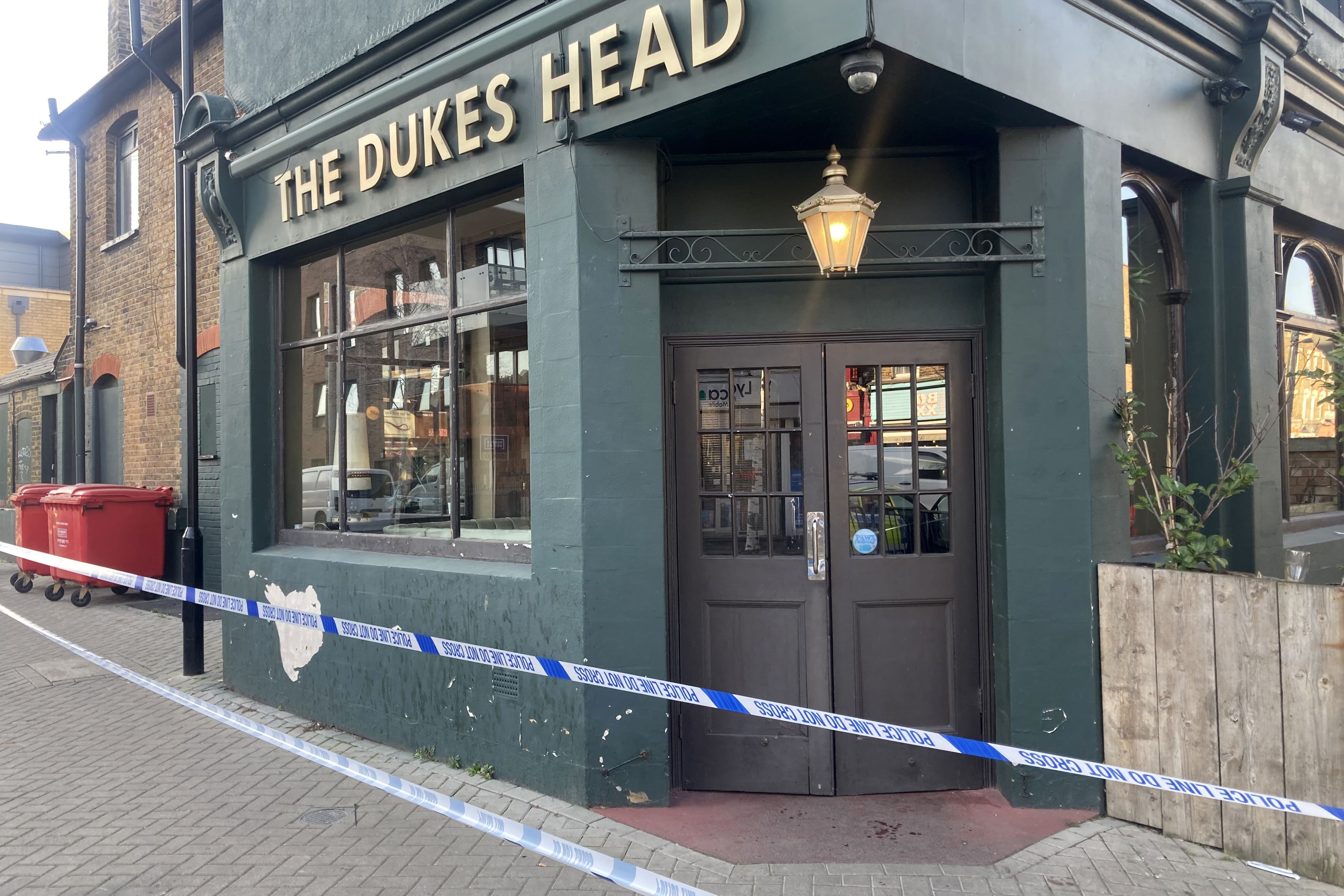 A police cordon outside a pub in Wood Street, Walthamstow, east London (Timothy Sigsworth/PA)