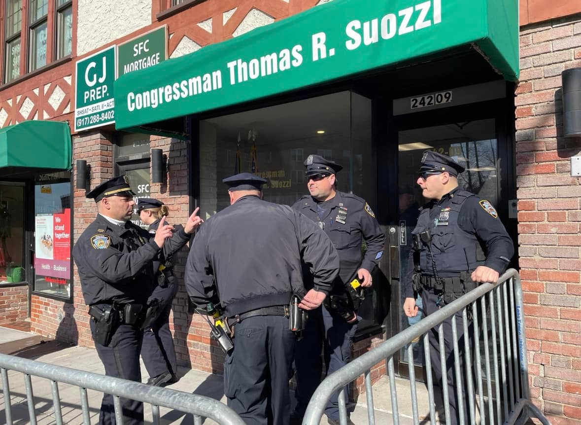 Police erect a barricade outside of George Santo’s district office in Douglaston, Long Island.