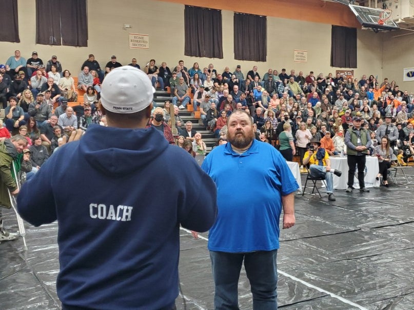 East Palestine Mayor Trent Conaway fields a question from a Beaver County resident during Ohio train derailment town hall in East Palestine, Ohio