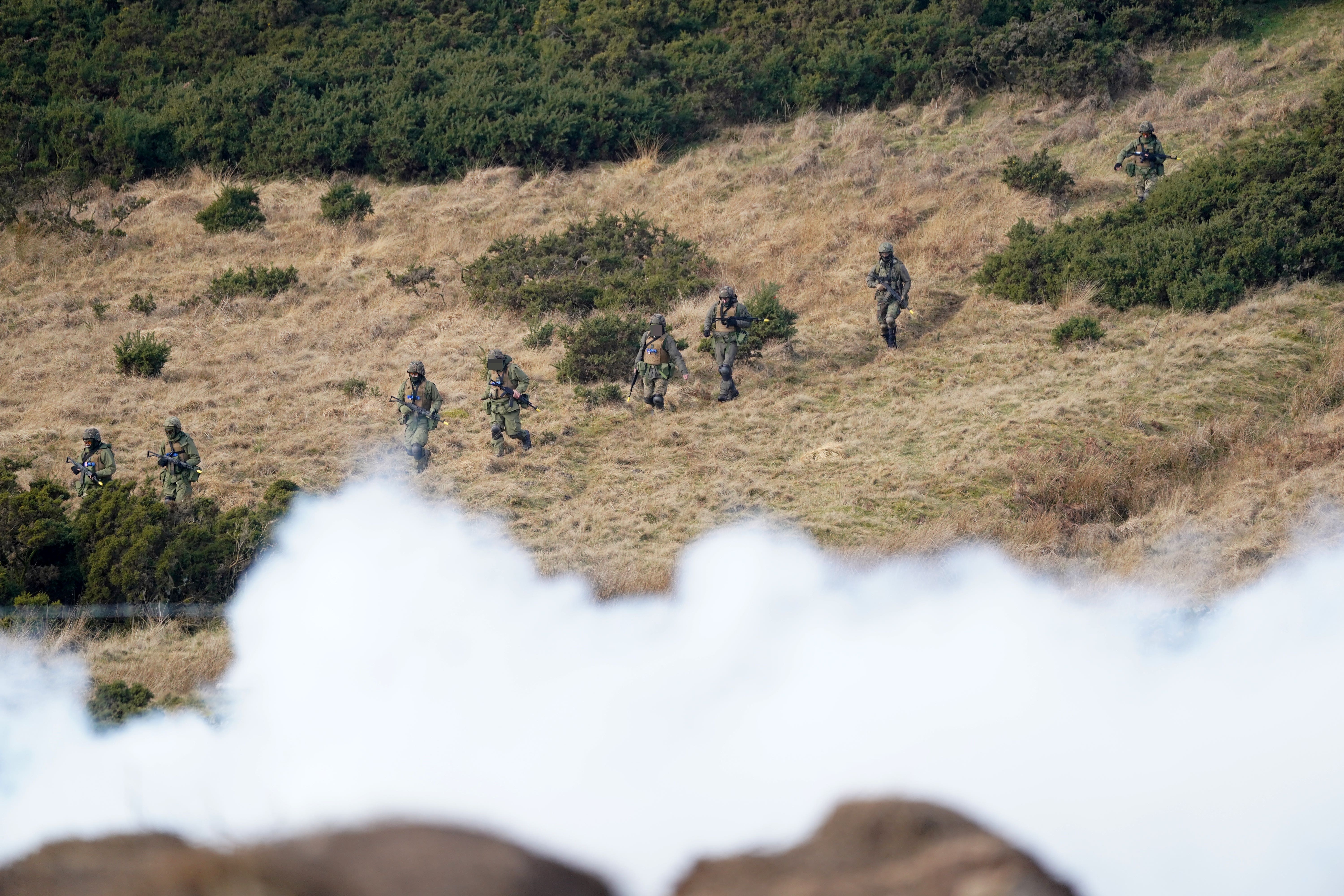 Ukrainian soldiers take part in a military exercise at a military training camp (Owen Humphreys/PA)