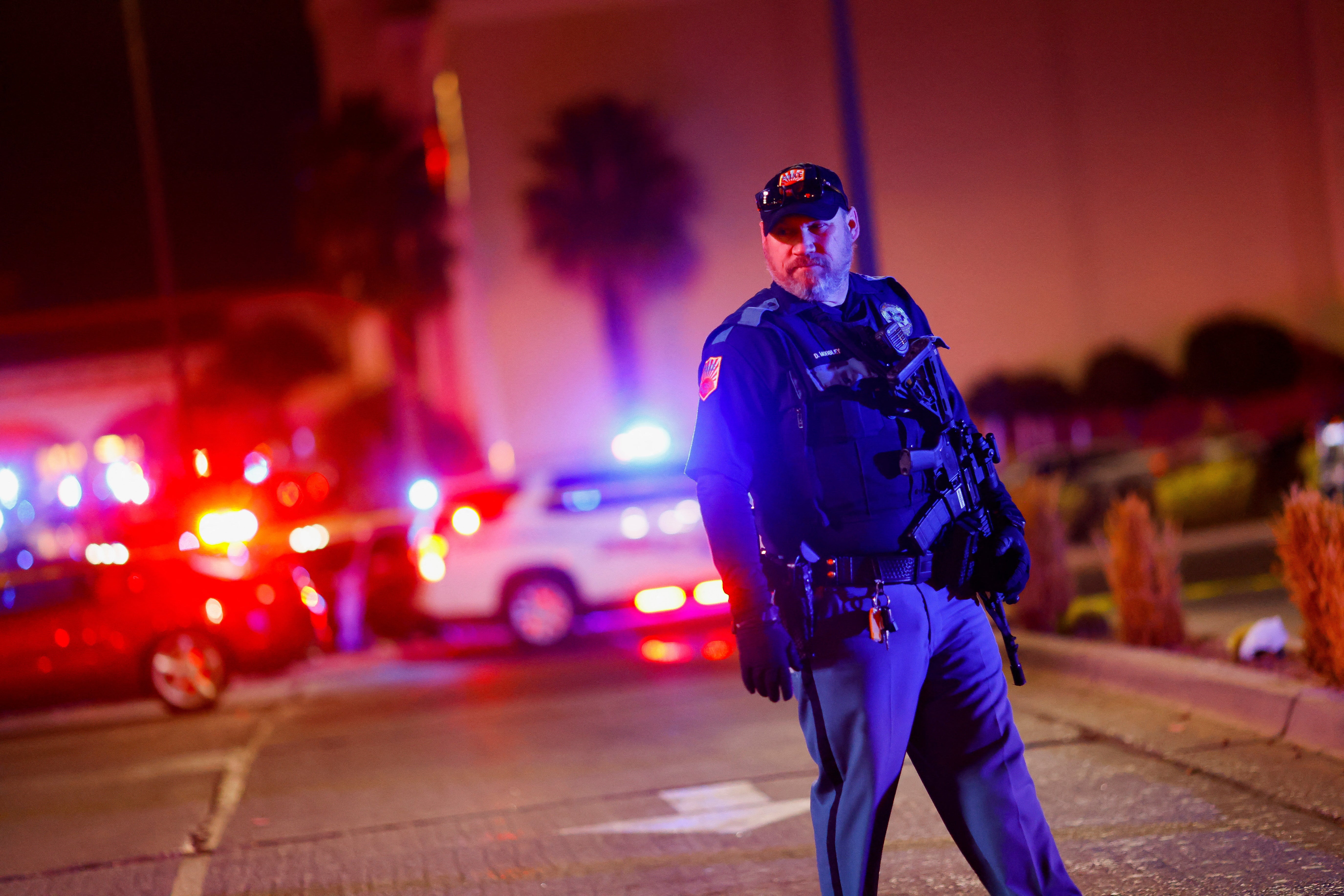 A law enforcement member looks on outside the Cielo Vista Mall after a shooting, in El Paso, Texas, U.S February 15, 2023