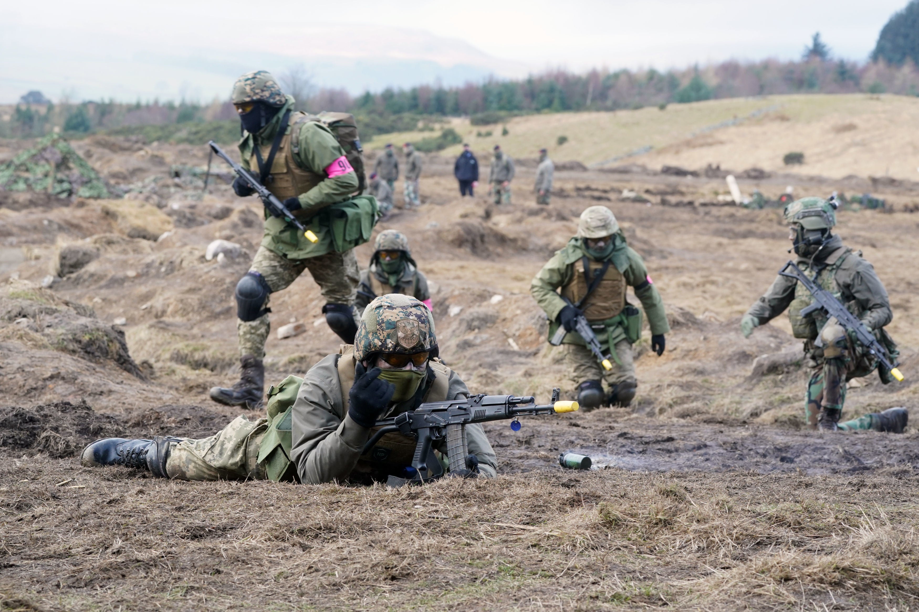 Ukrainian soldiers take part in a military exercise at a military training camp in Yorkshire during a visit by defence ministers from the Joint Expeditionary Force nations