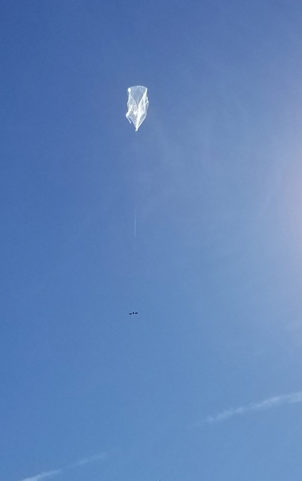 A balloon carrying a solar-powered transmitter