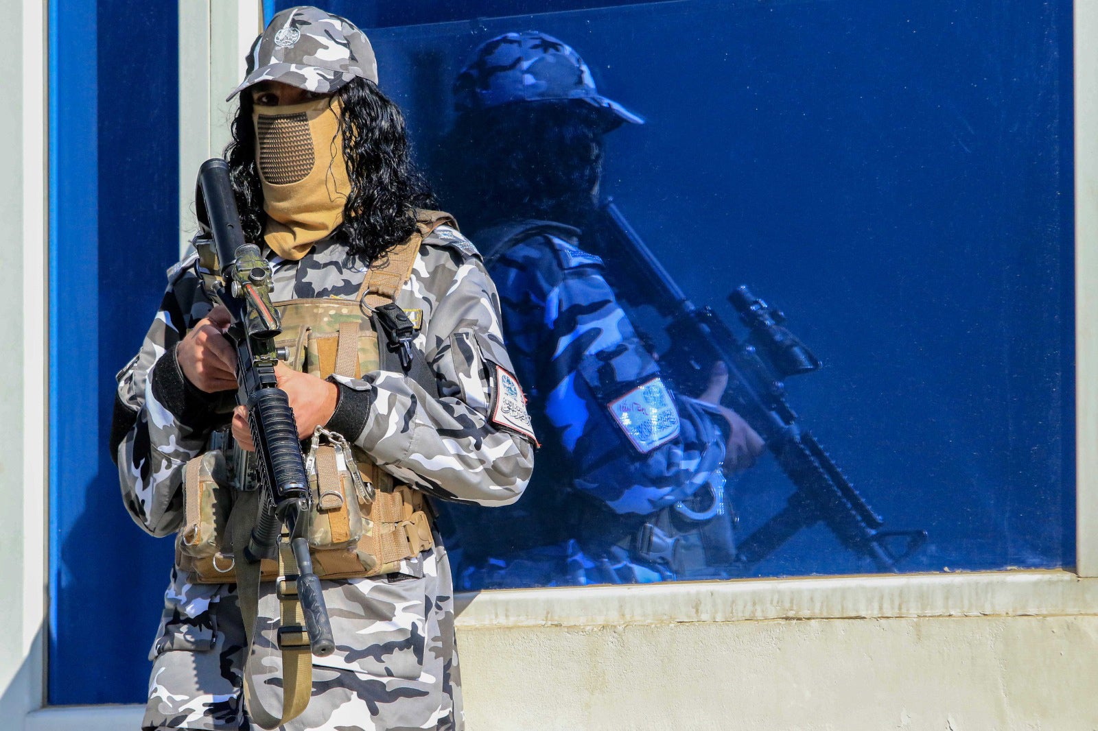 A Taliban police officer attends a ceremony for the distribution of new uniforms to prison police in Kabul on 7 February