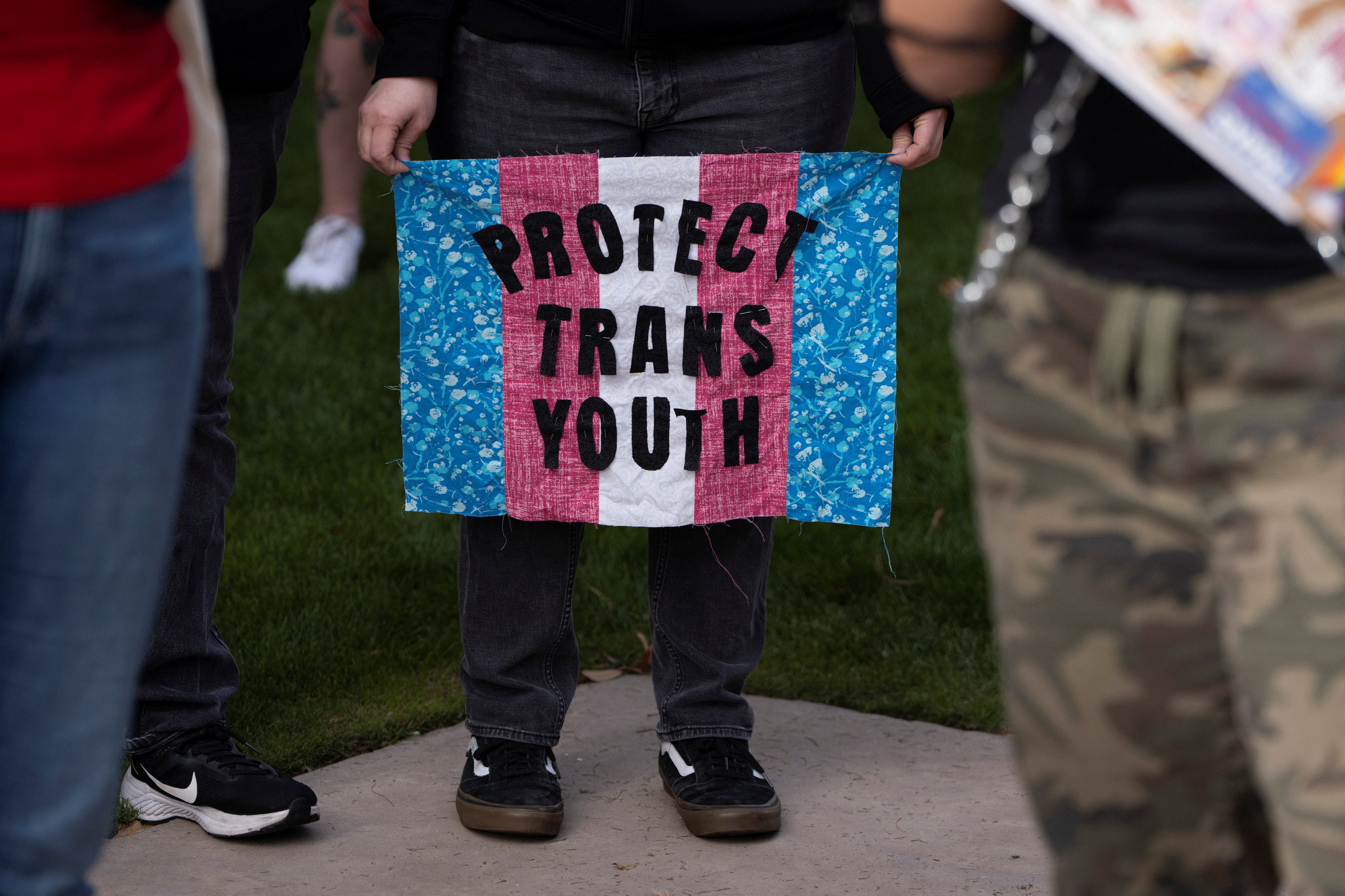 Demonstrators march outside the Arizona State Capitol in Phoenix on 22 January.