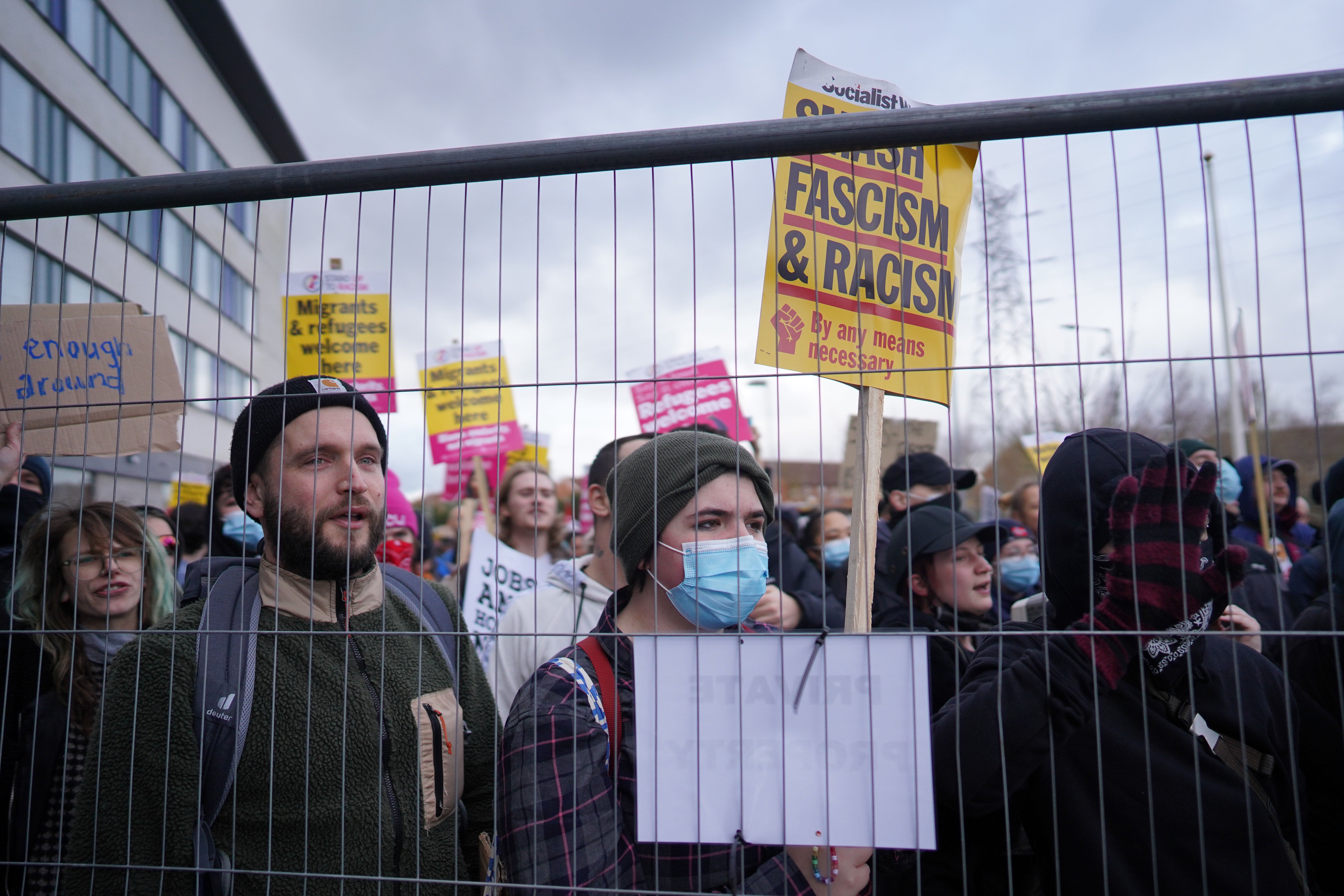 Protesters outside a Holiday Inn, Rotherham – far-right and pro-immigration activists have been clashing across the UK