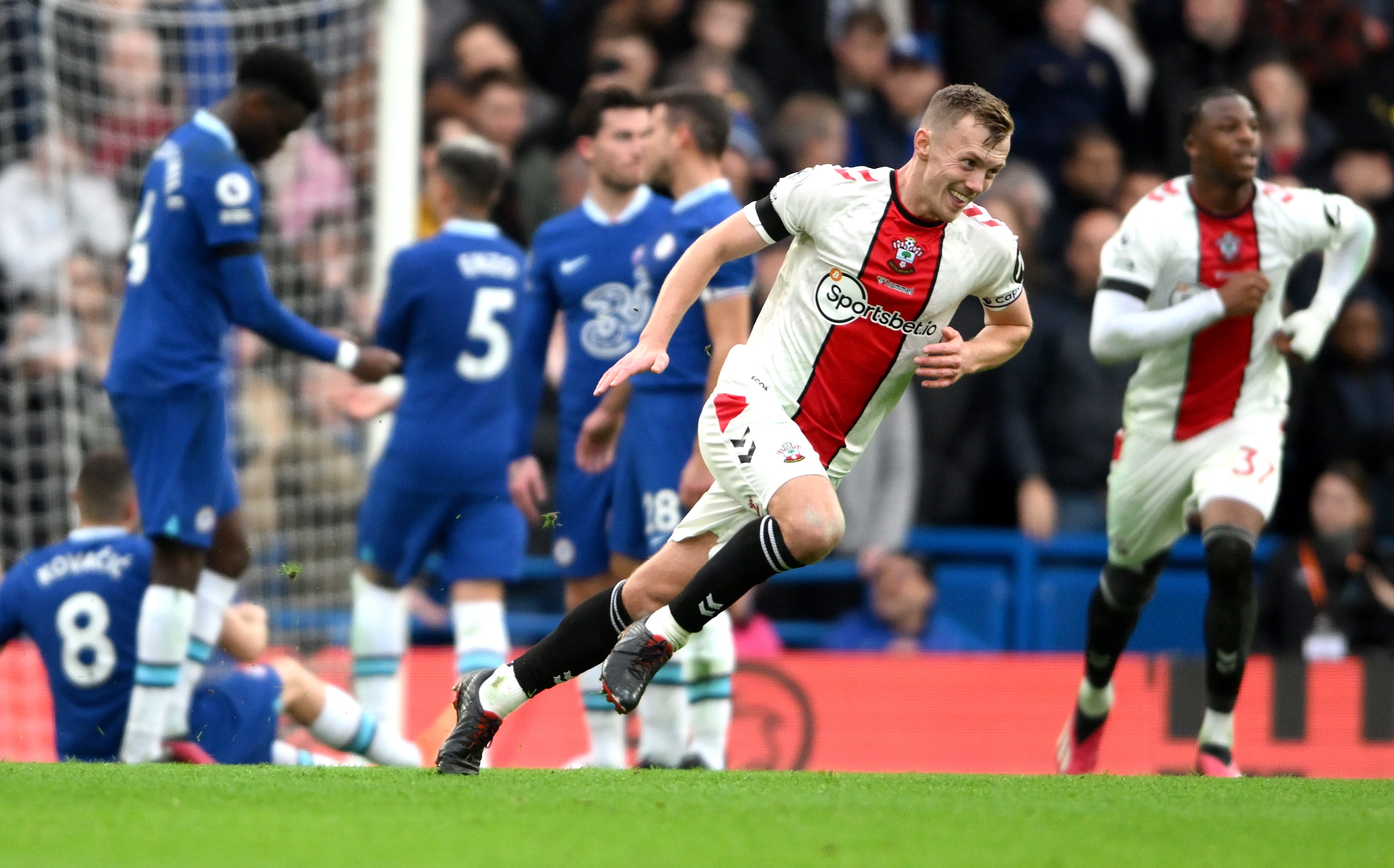 Ward-Prowse wheels away in celebration after his free-kick hits the back of the net