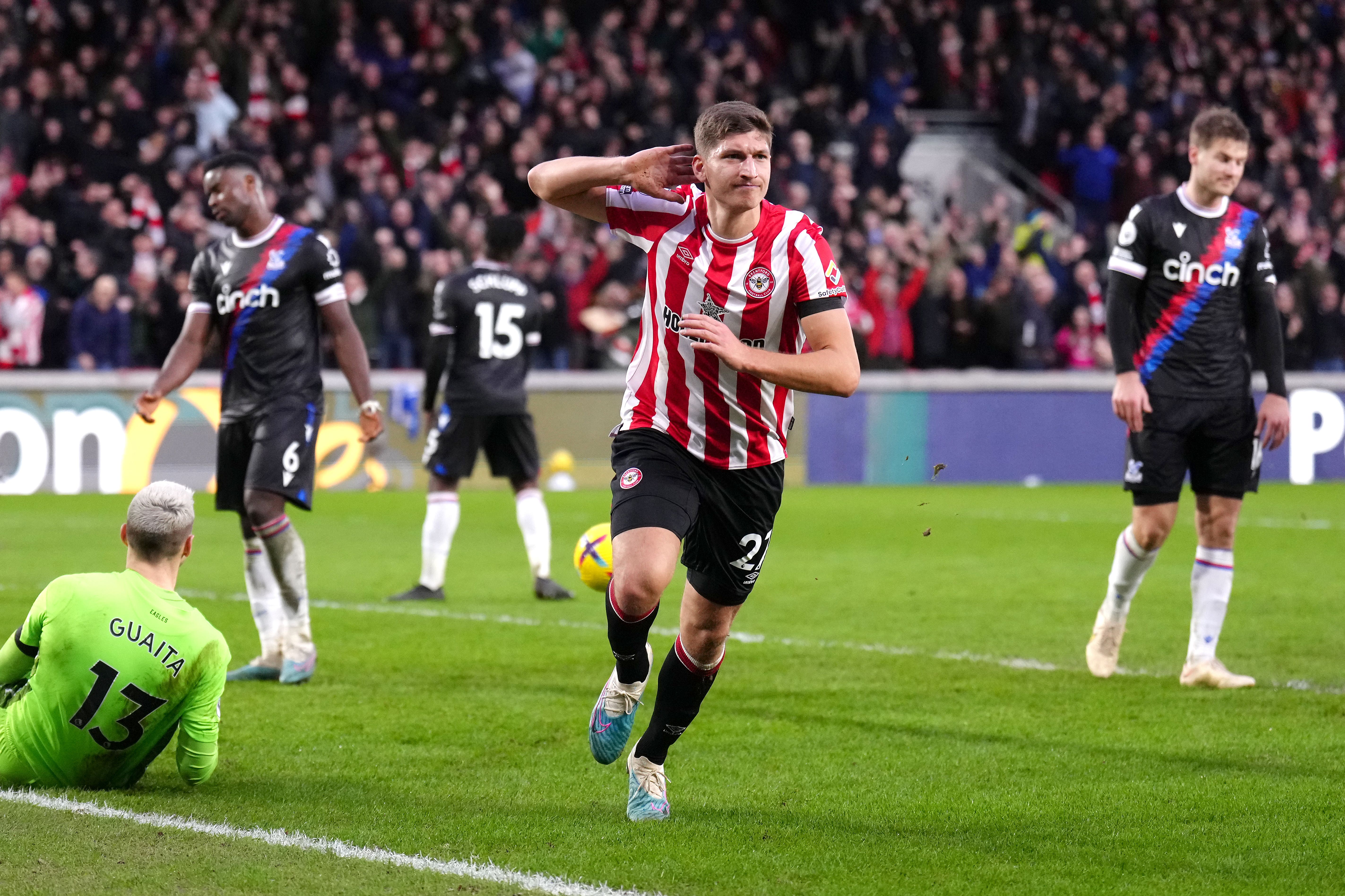 Vitaly Janelt (centre) celebrates scoring an injury-time equaliser for Brentford against Crystal Palace (John Walton/PA images).