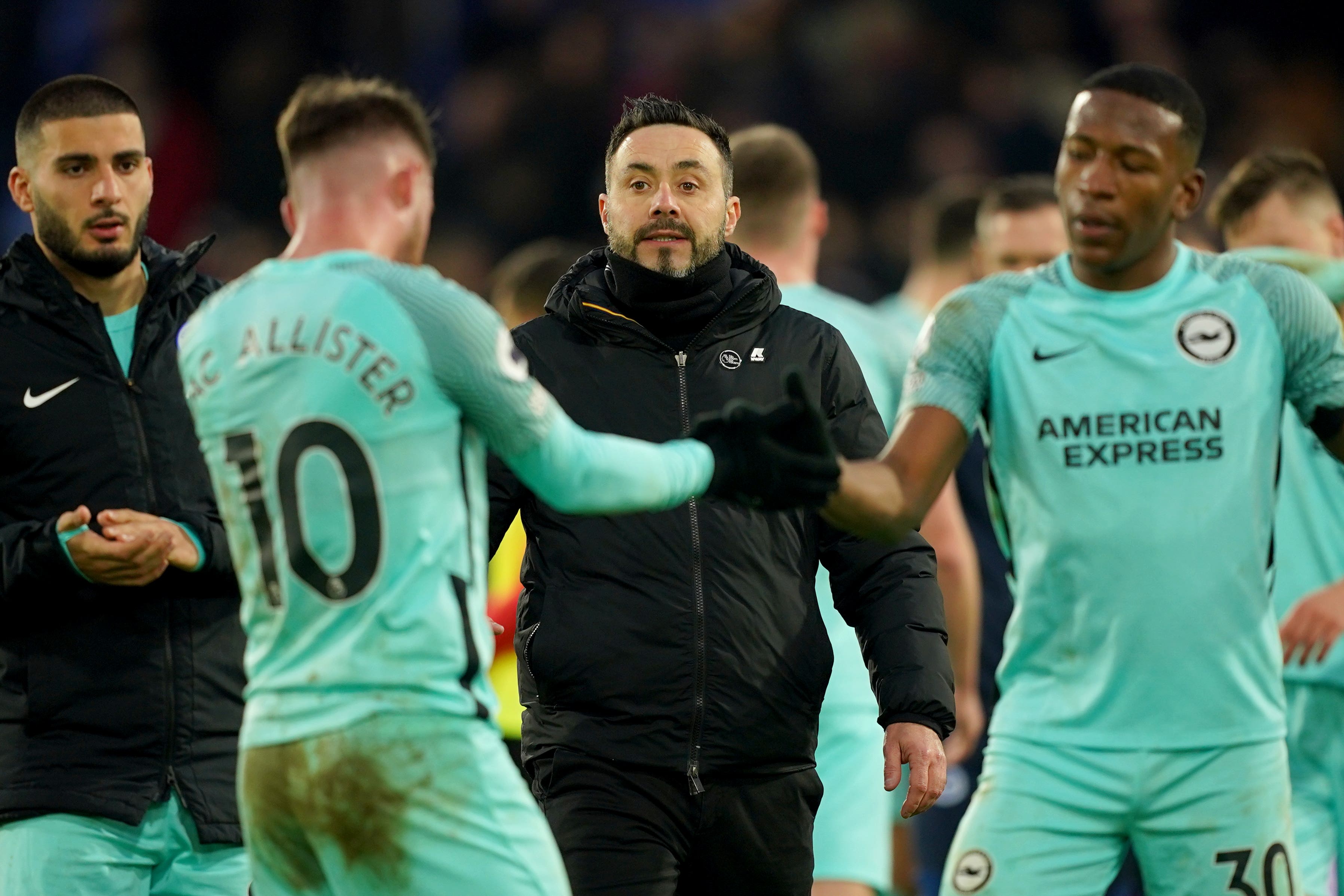 Brighton boss Roberto De Zerbi (centre) came onto the pitch to challenge Darren England at full-time (Yui Mok/PA)