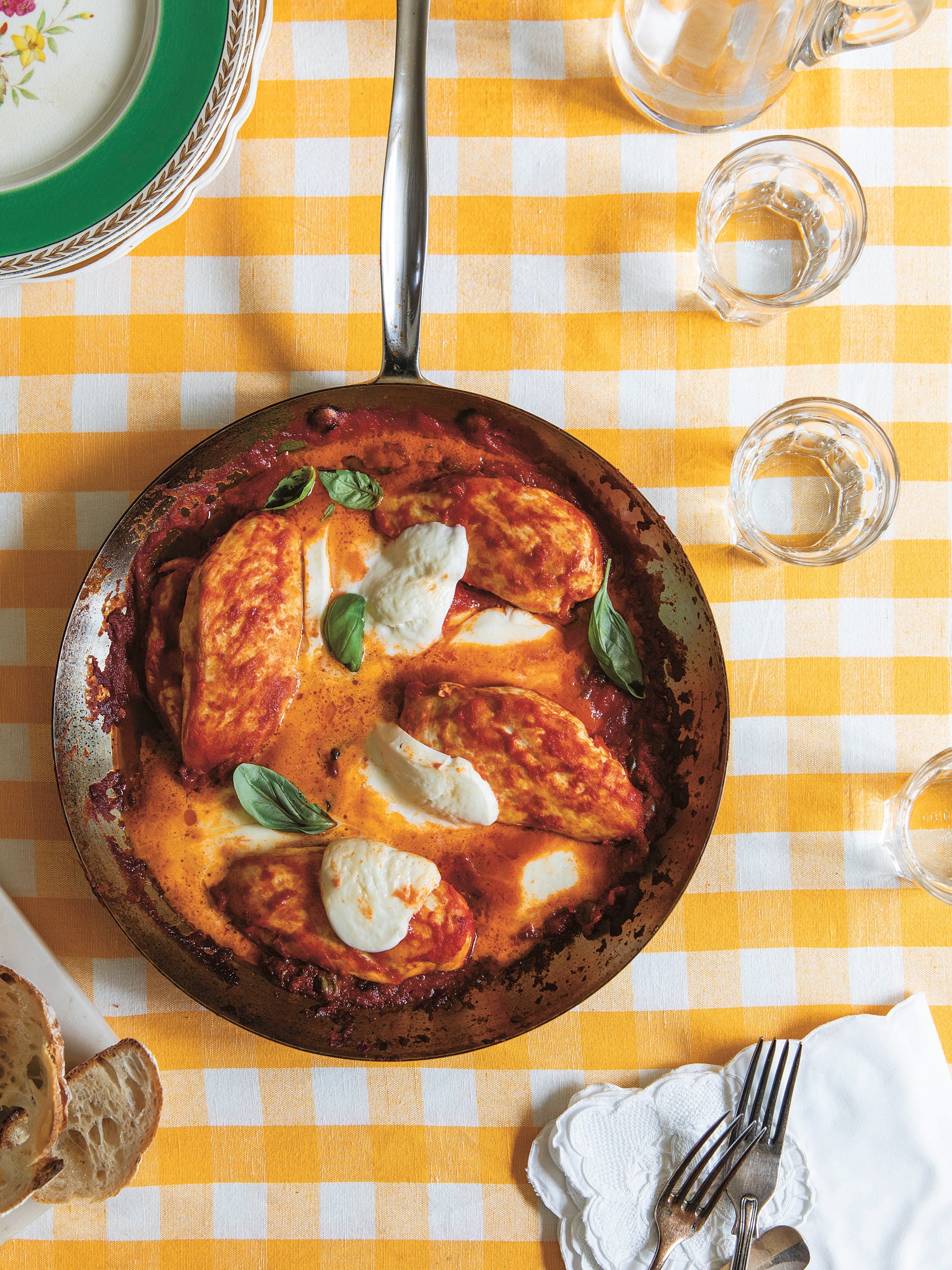 Succulent chicken breasts in tomato sauce are topped with melted mozzarella in this Italian dish