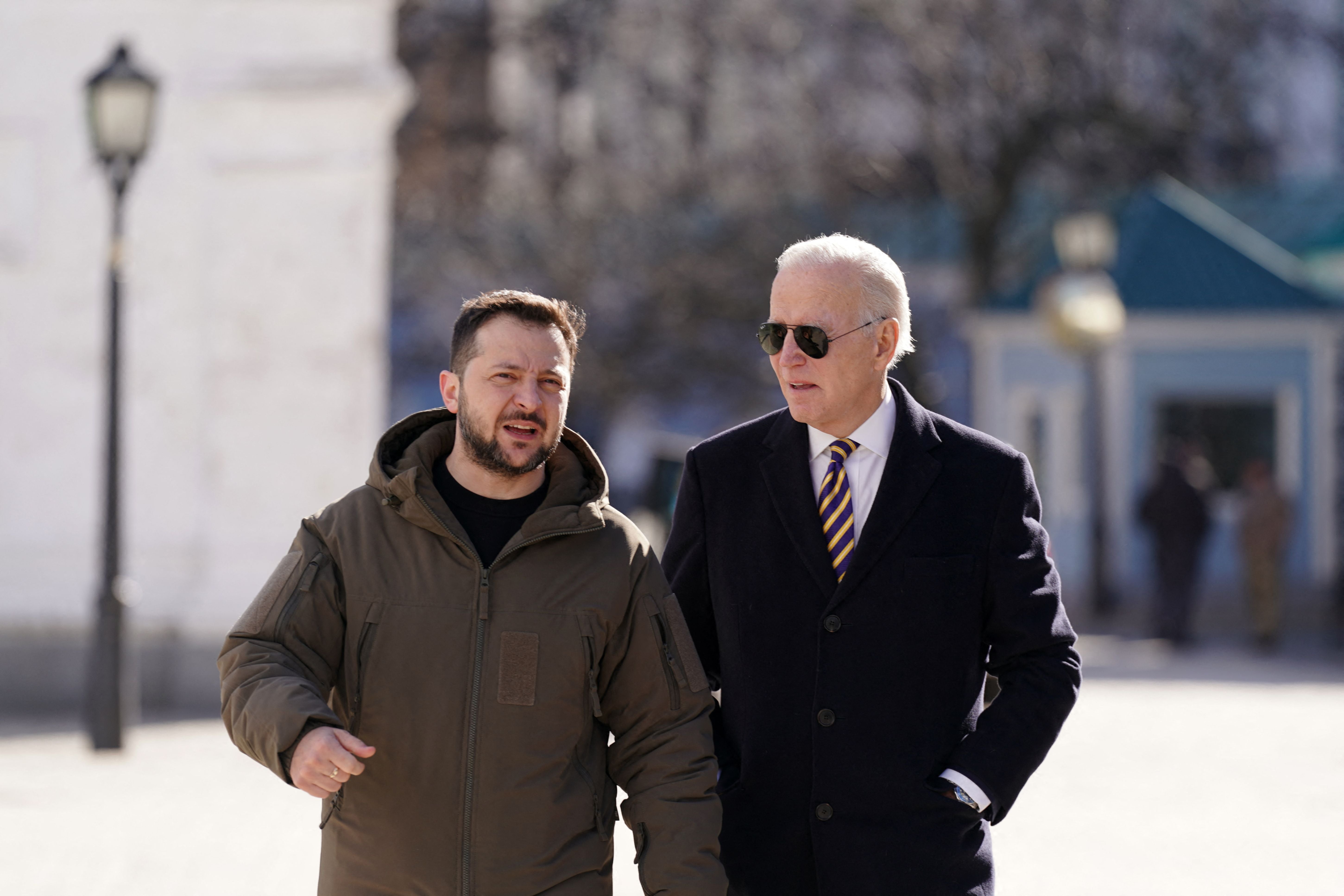 Biden and Zelensky walk side by side around Kyiv as air raid sirens ring out