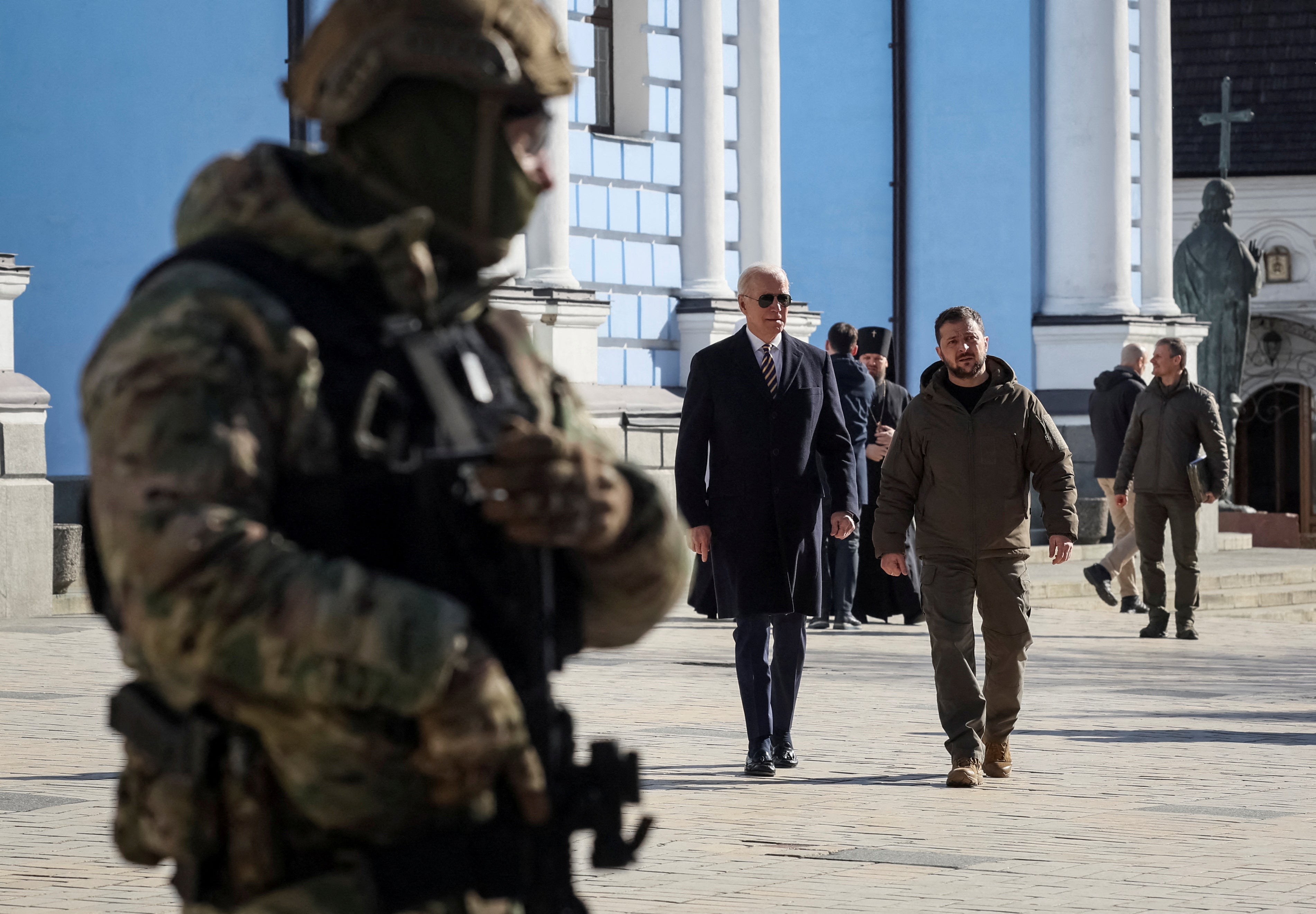 President Biden, left, walks with President Zelensky during the visit on Monday