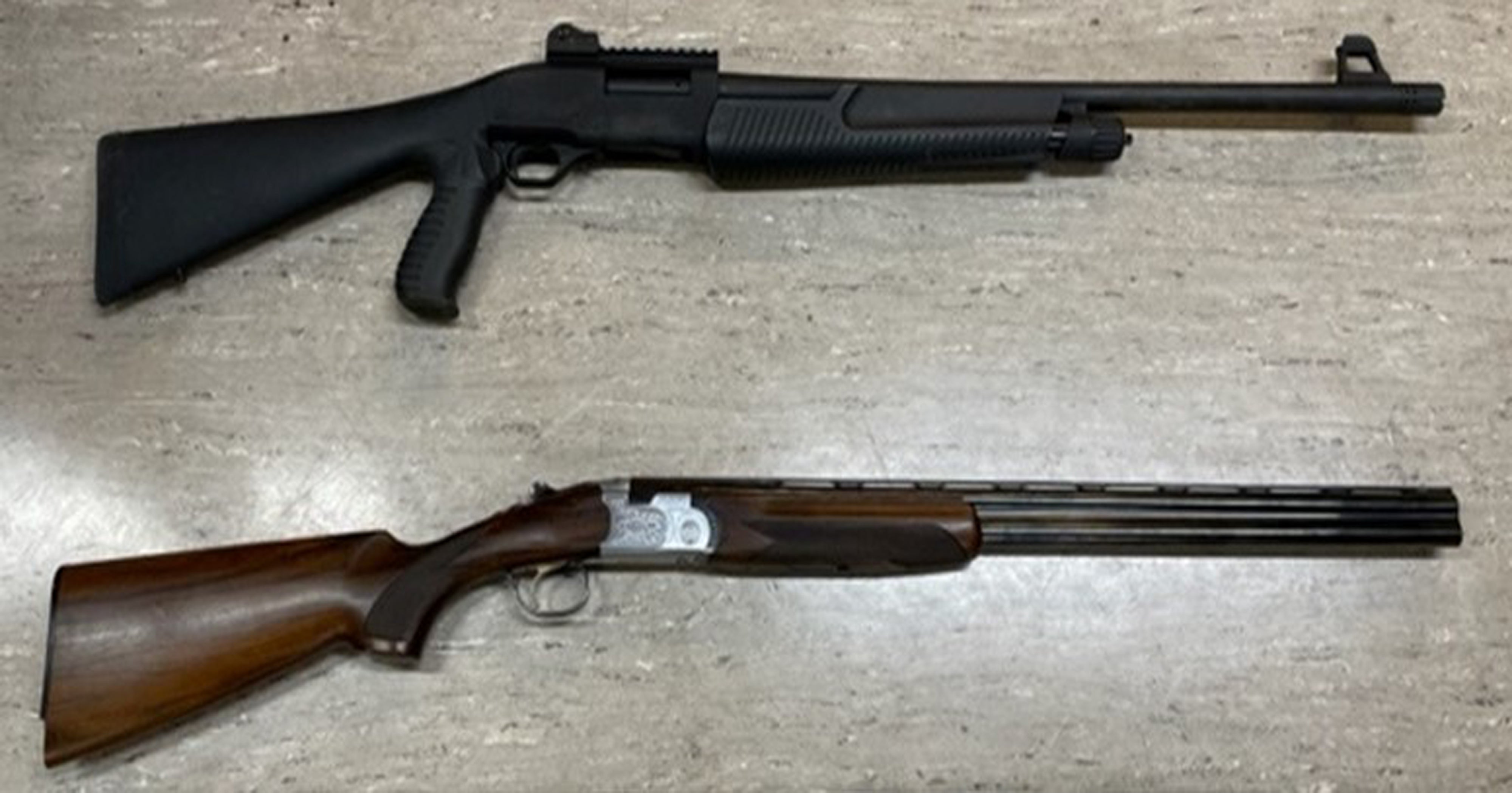 A Weatherby pump action shotgun (top) used by Jake Davison next to a standard sporting style 12 - gauge over - under twin barrel shotgun (below)