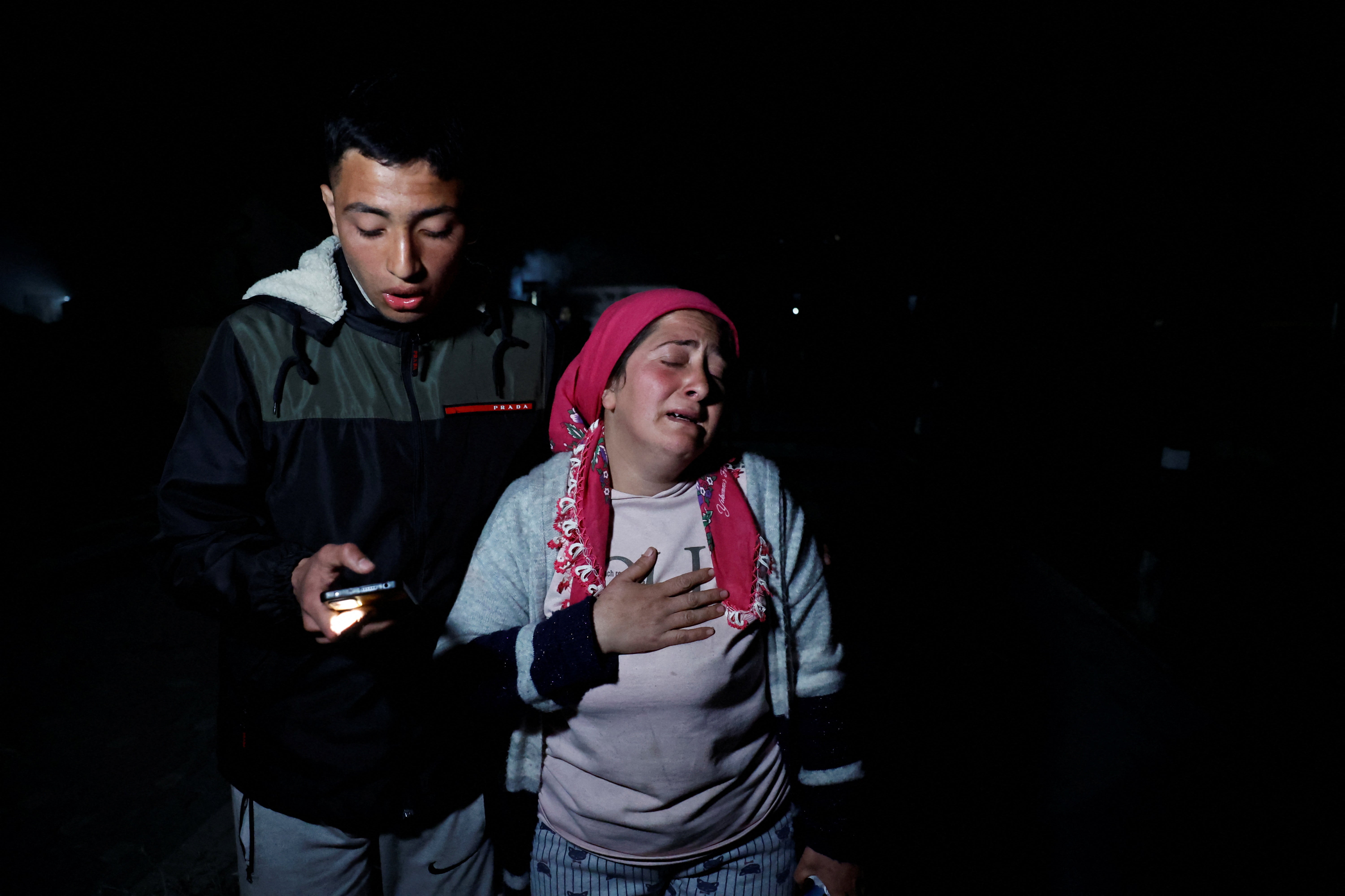 People react after another earthquake in Antakya in Hatay province, Turkey on 20 February