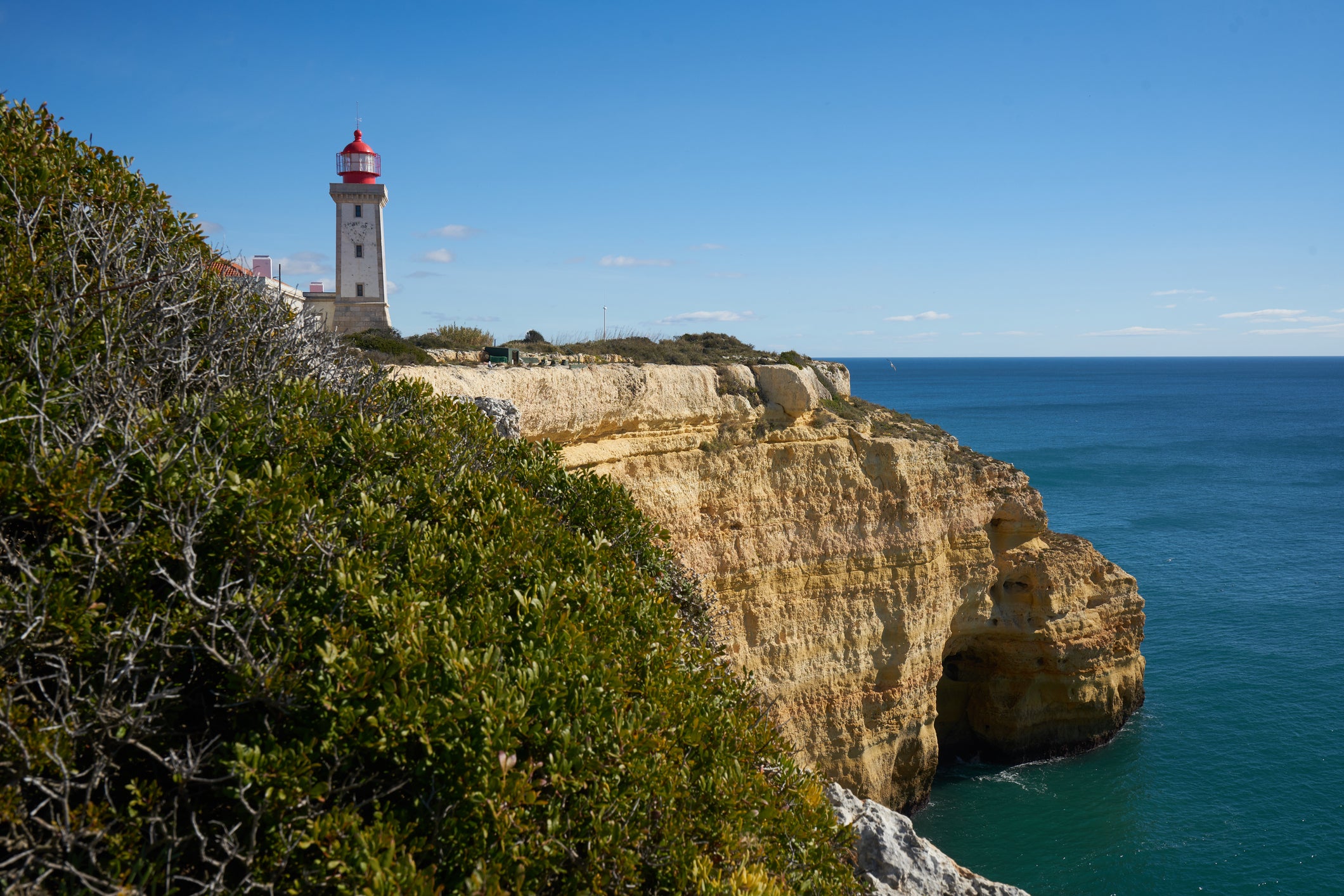 Farol de Alfanzina Lighthouse landscape in Algarve, Portugal