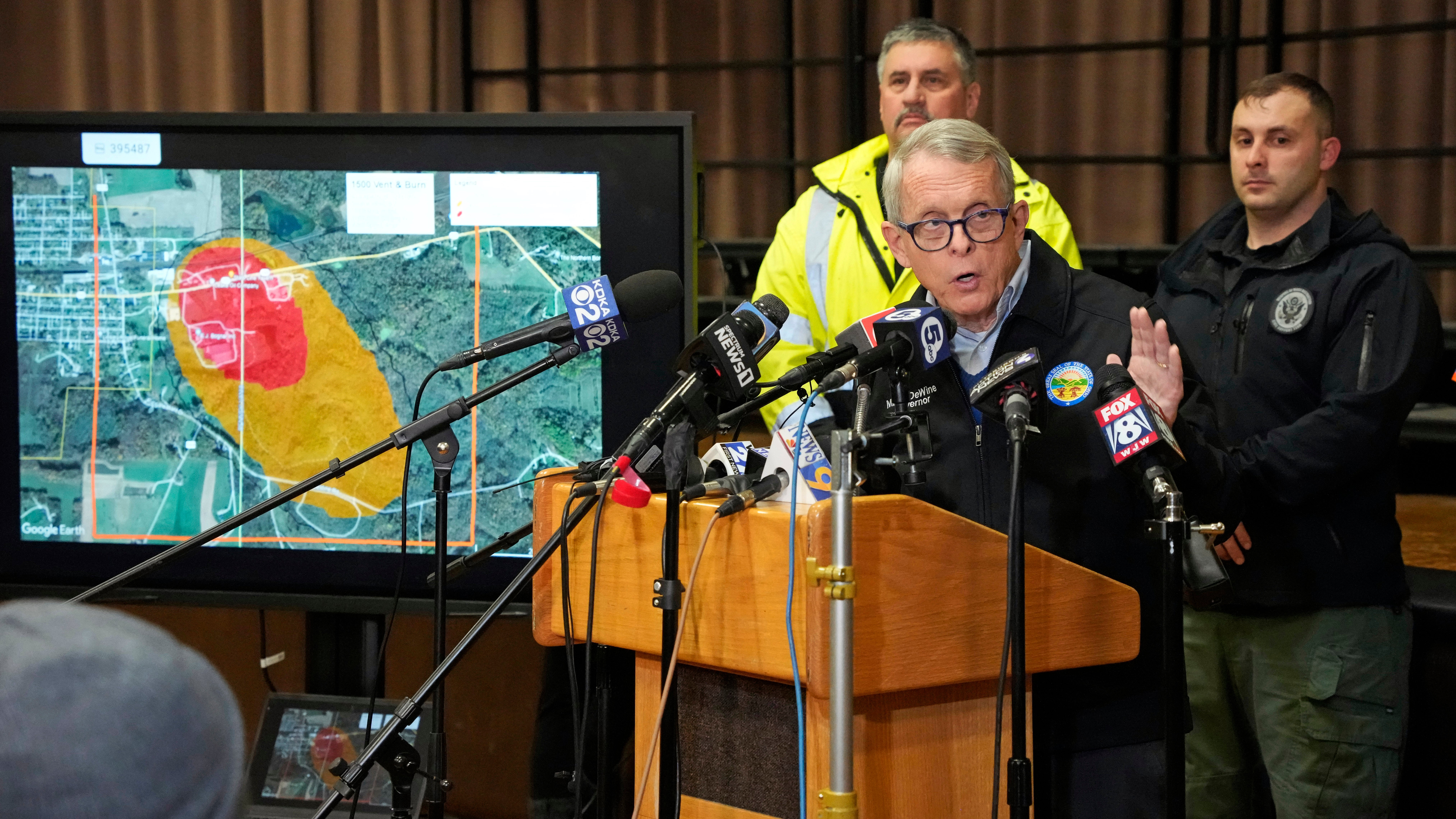 Ohio Gov. Mike DeWine meets with reporters after touring the Norfolk Southern train derailment site in East Palestine, Ohio, on Feb. 6, 2023