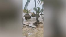 Cyclone Freddy winds destroy sunshades on Mauritius beach