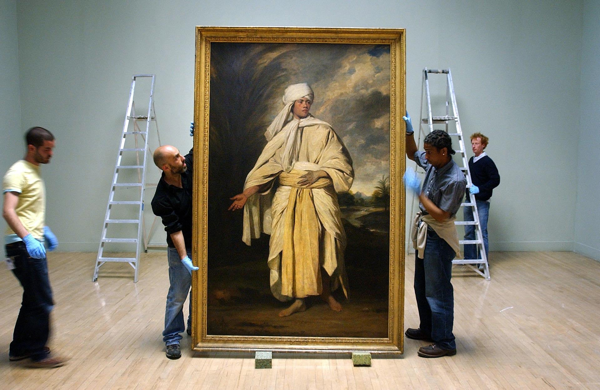 Joshua Reynolds ‘Portrait of Omai’ is moved before hanging at Tate Britain