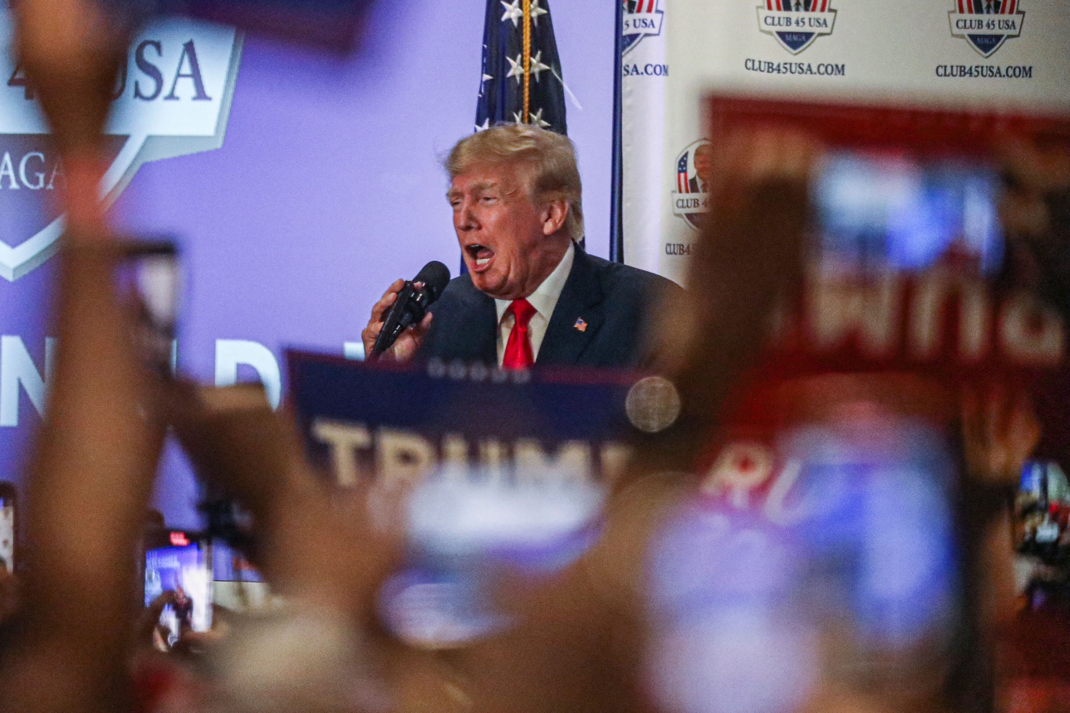 Former US President Donald Trump speaks to supporters during Trump's President Day event at the Hilton Palm Beach Airport in West Palm Beach, Florida, on February 20, 2023