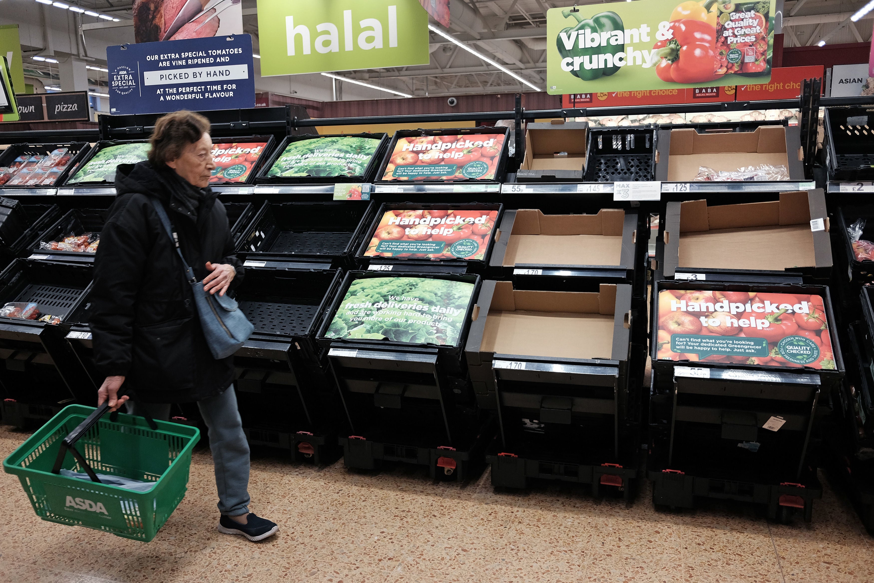 Empty fruit and veg displays at Asda