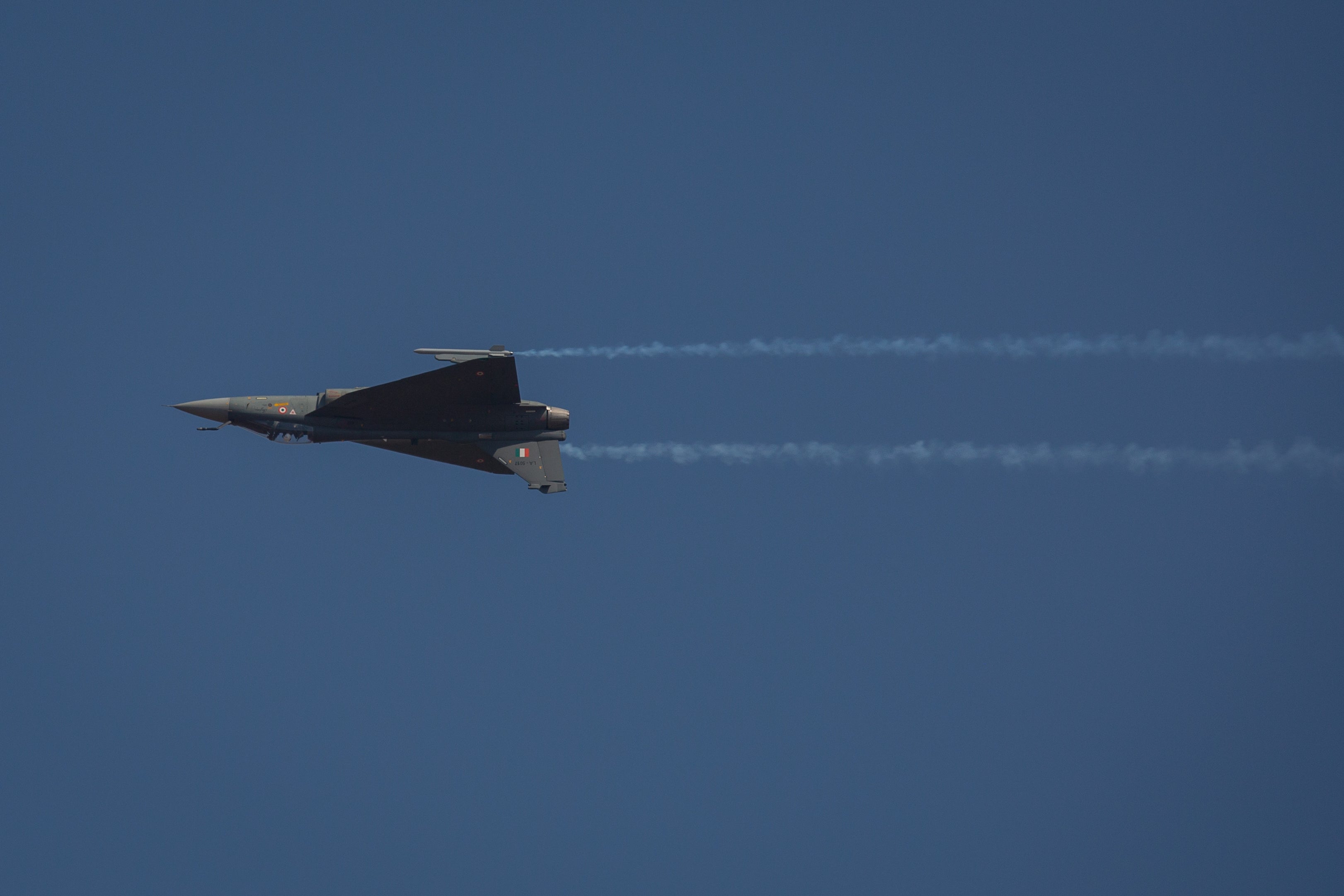 An Indian Air Force Light Combat Aircraft (LCA) performs during the inauguration of the Aero India 2023 at the Yelahanka Air Force Station in Bengaluru, India