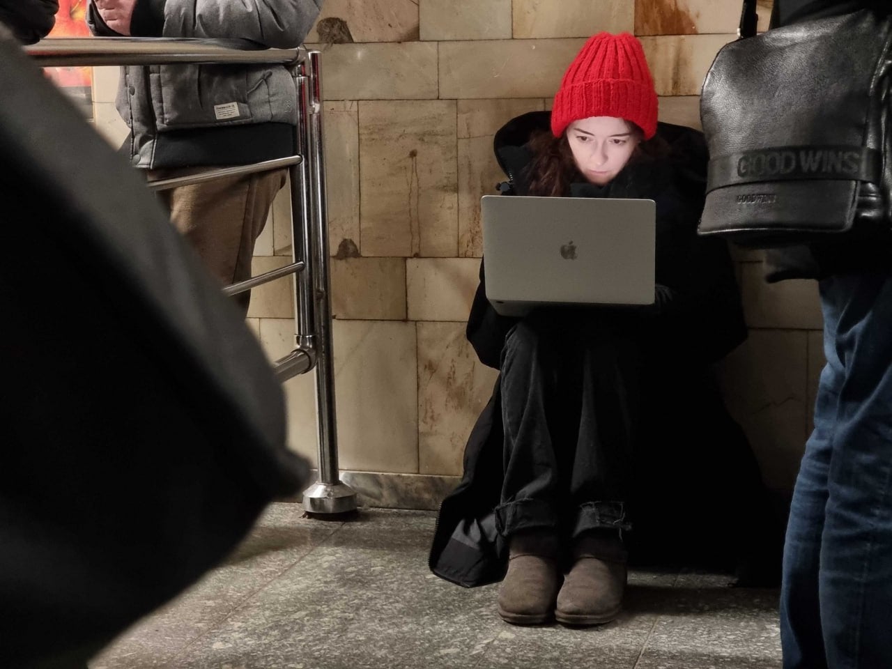 Olga Rudenko working in the metro station during one of the missile strikes in Kyiv in December 2022