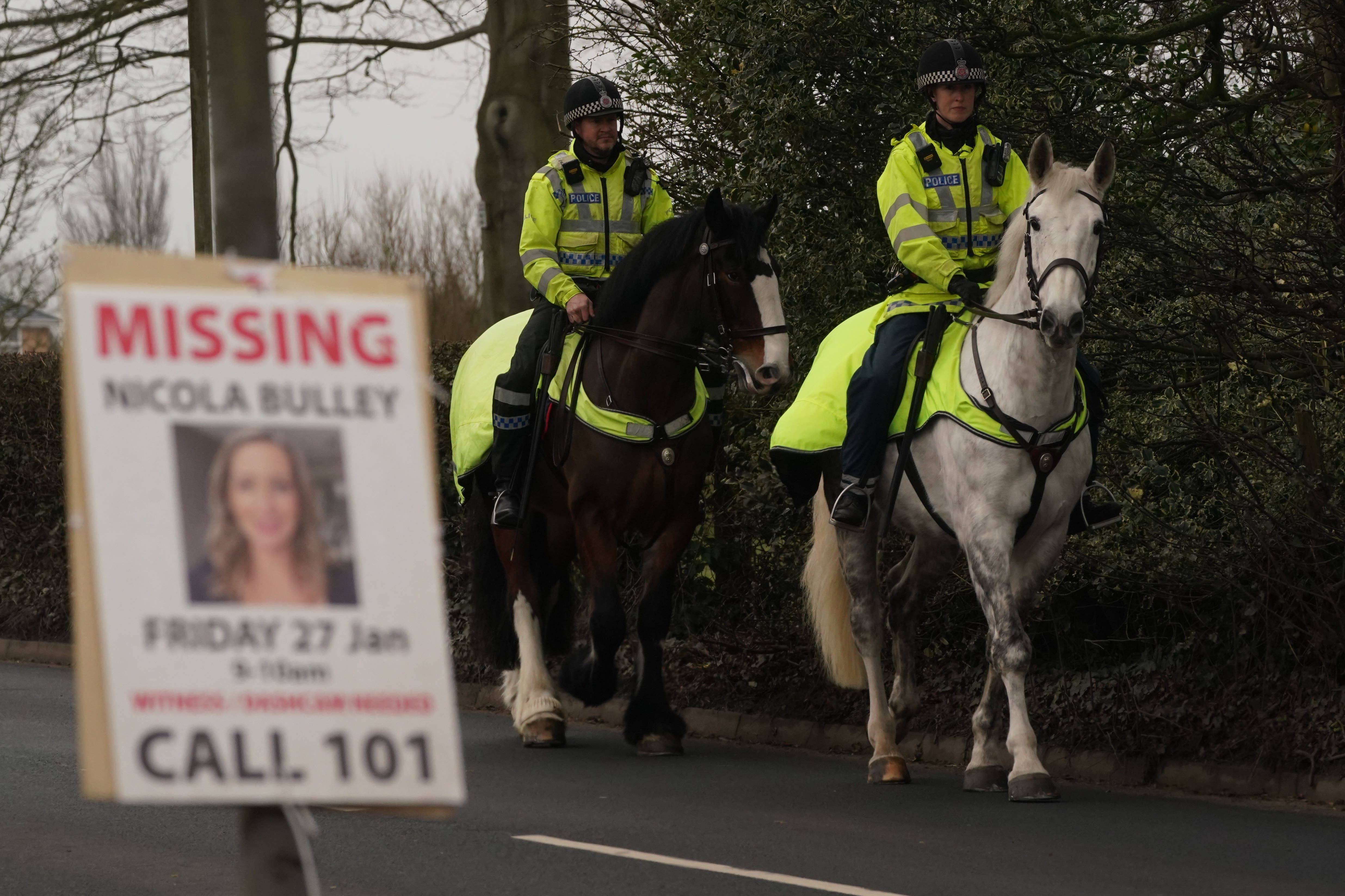 A missing poster of Ms Bulley after she disappeared near the River Wyre