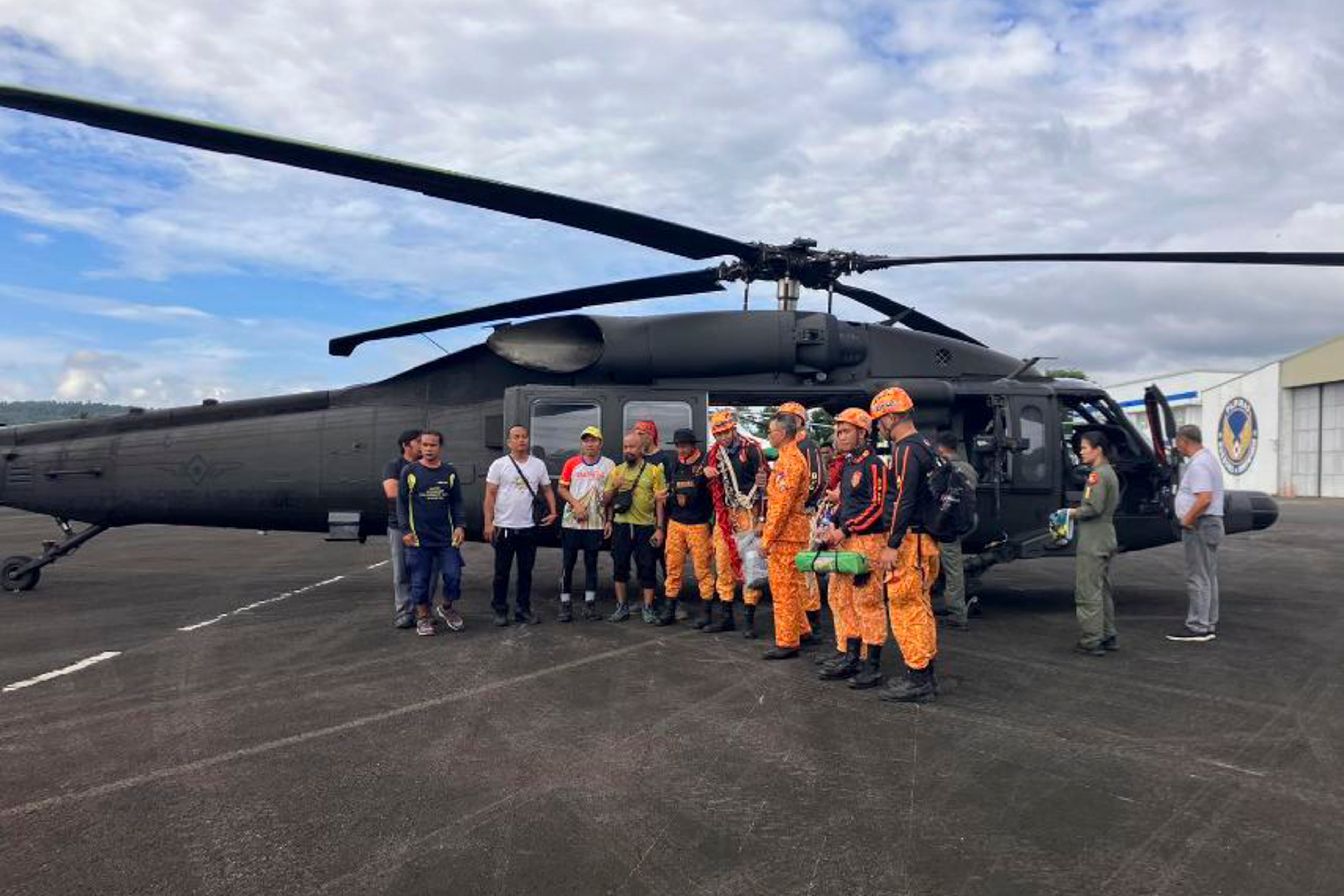 File: Rescuers prepare to search for passengers of a Cessna 340 aircraft with registry number RP-C2080 at Tumpa Gulley, Camalig town, Albay province, the Philippines on Monday