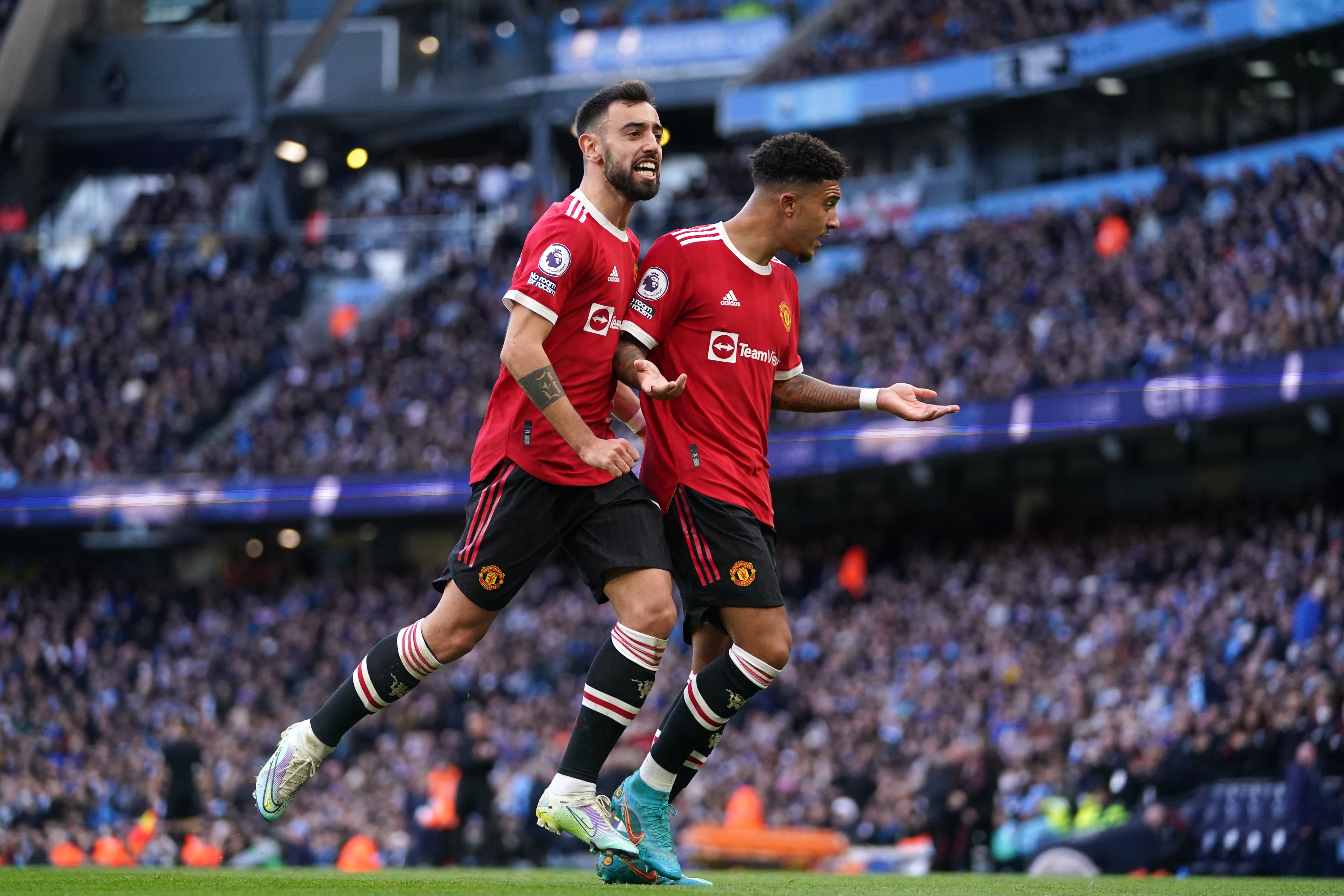 Manchester United’s Bruno Fernandes, left, and Jadon Sancho (Martin Rickett/PA)