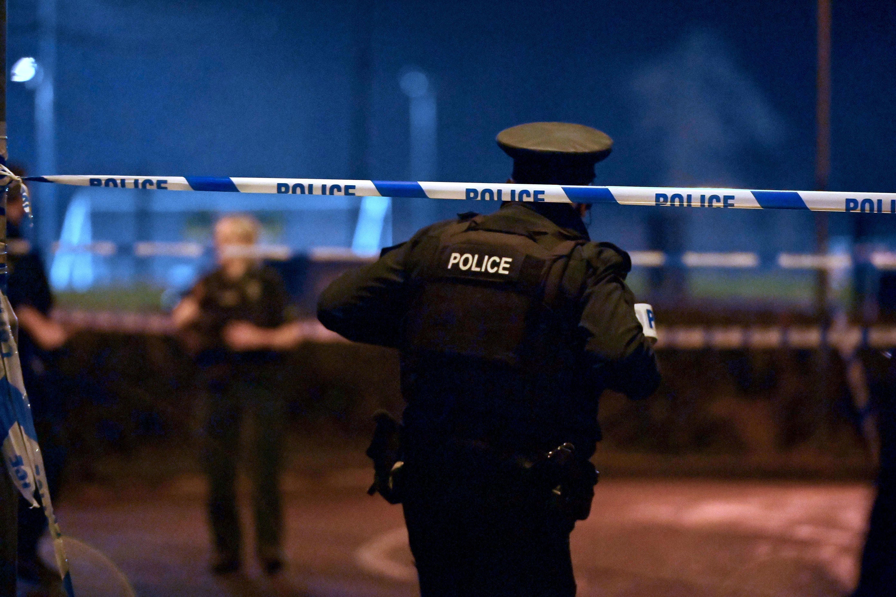 PSNI officers at the scene of a shooting in the Killyclogher Road area of Omagh