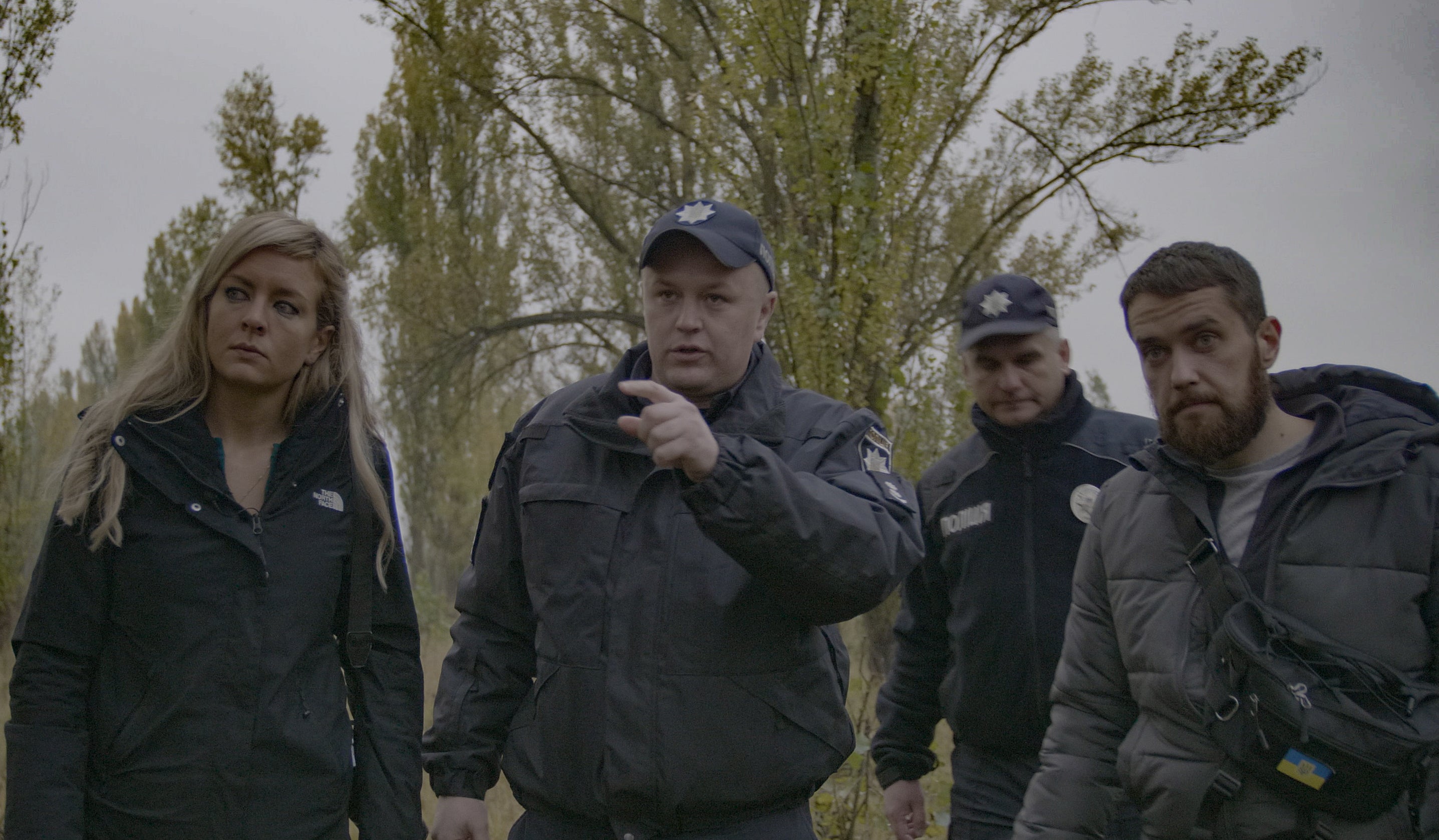 Bel Trew interviewing Ukrainian police for her The Body in the Woods documentary