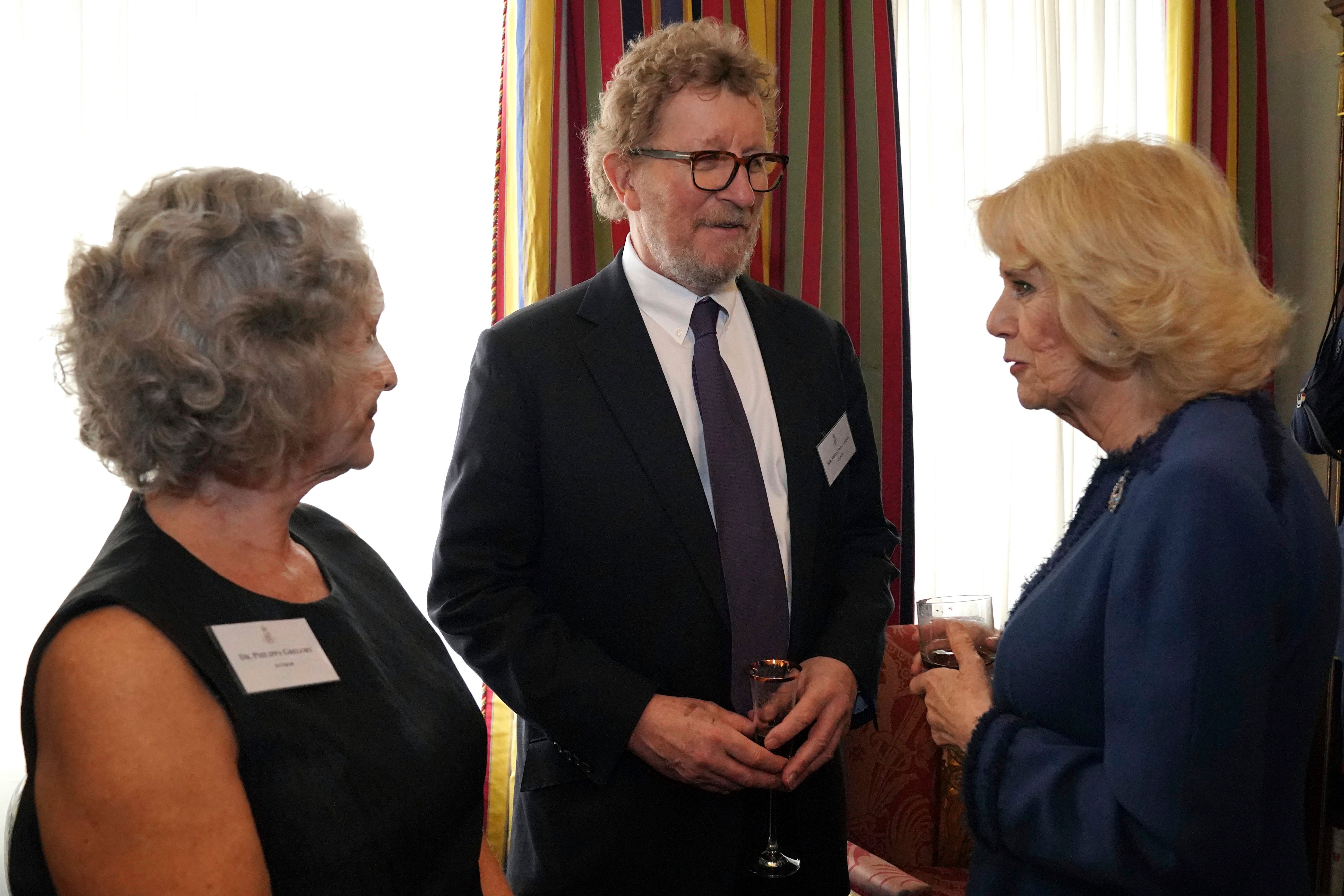 The Queen Consort meets authors Philippa Gregory and Sebastian Faulks