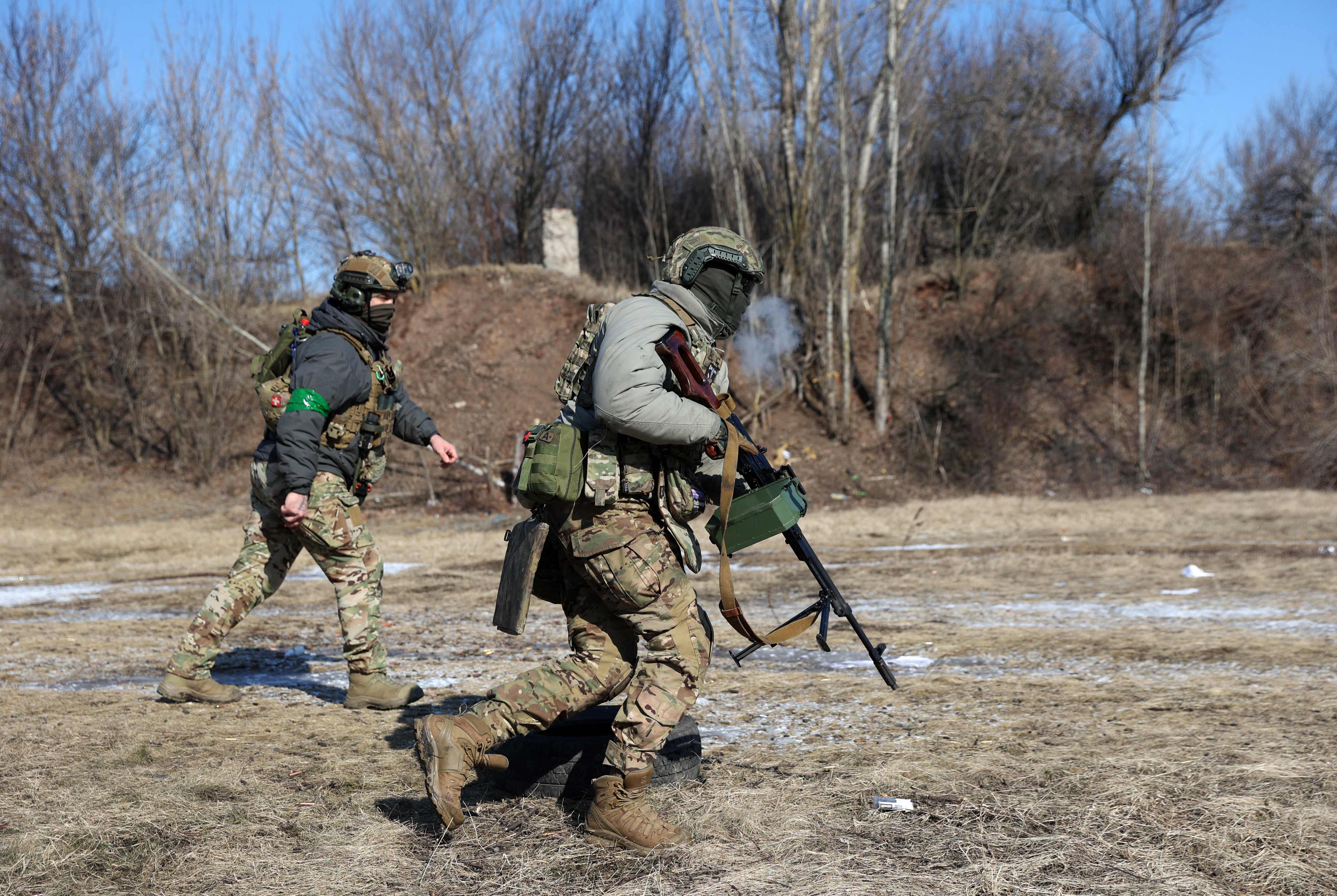 Ukrainian servicemen attend a training session in the Kharkiv region on Thursday