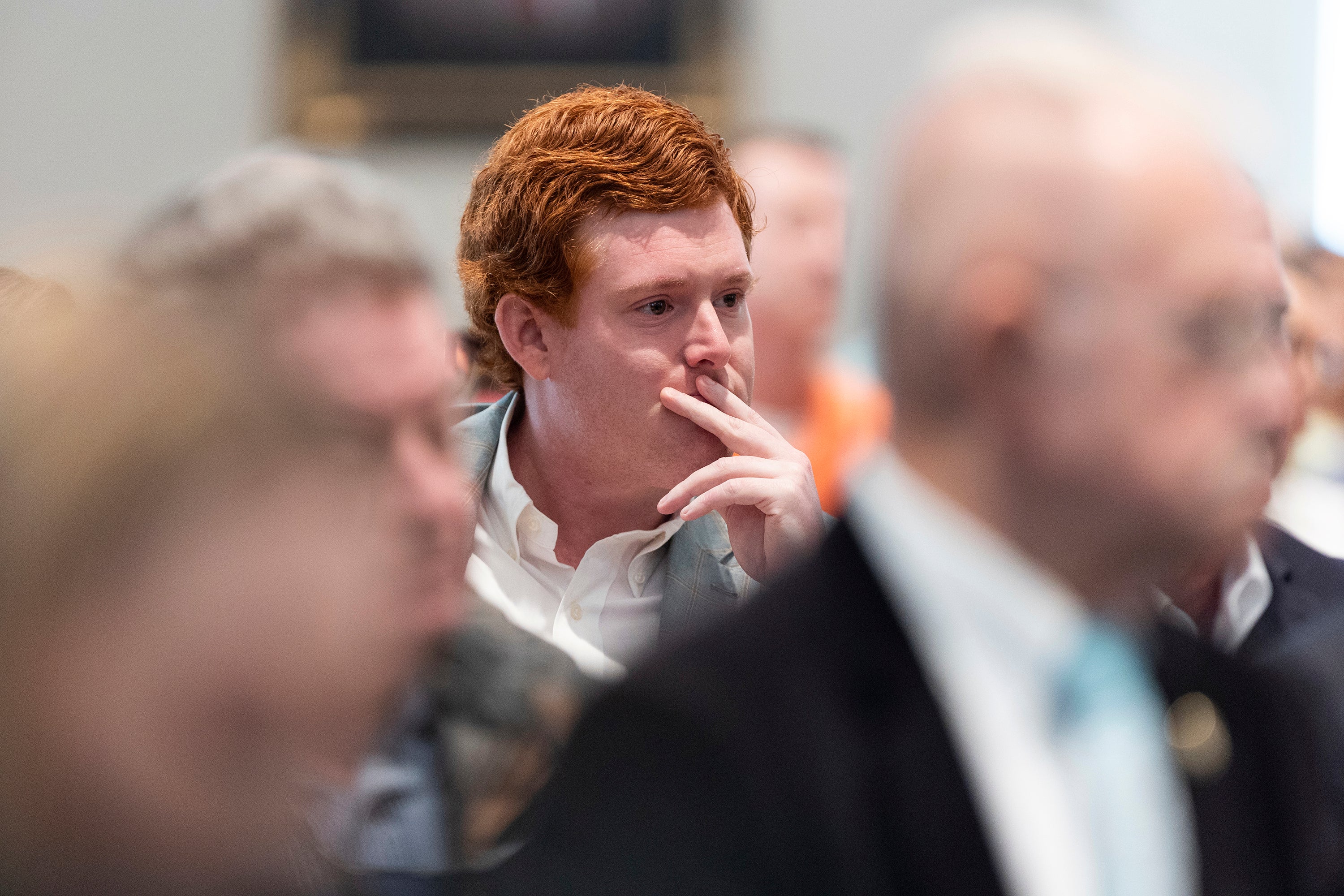 Buster Murdaugh listens as his father testifies in court on Thursday