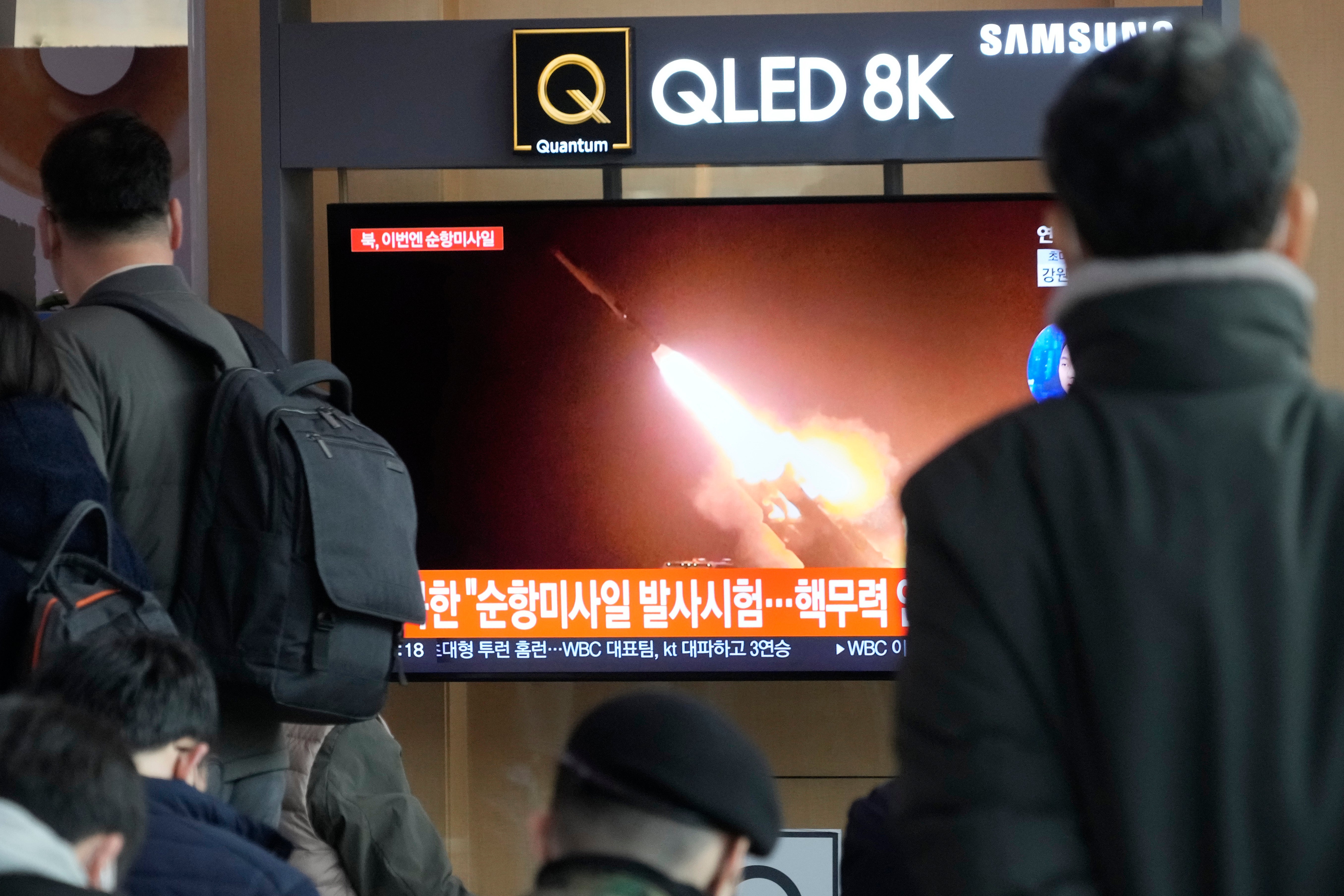 A TV screen shows a file image of North Korea's missile launch during a news program at the Seoul Railway Station in Seoul