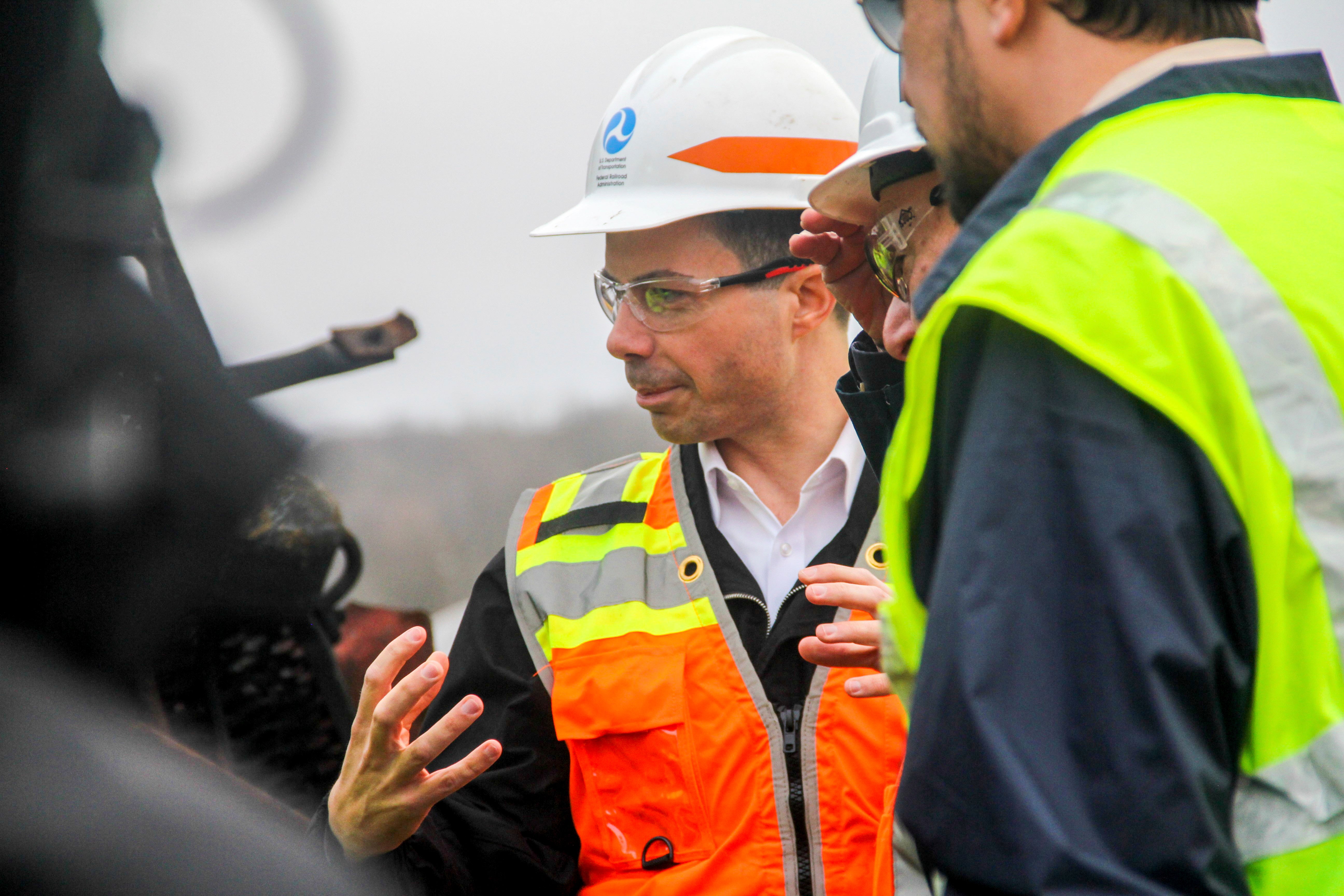 Transportation Secretary Pete Buttigieg tours the site on 23 February