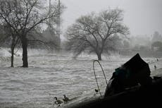 California storms ‘a matter of life and death’ for homeless, LA mayor warns, as winds and rain lash region