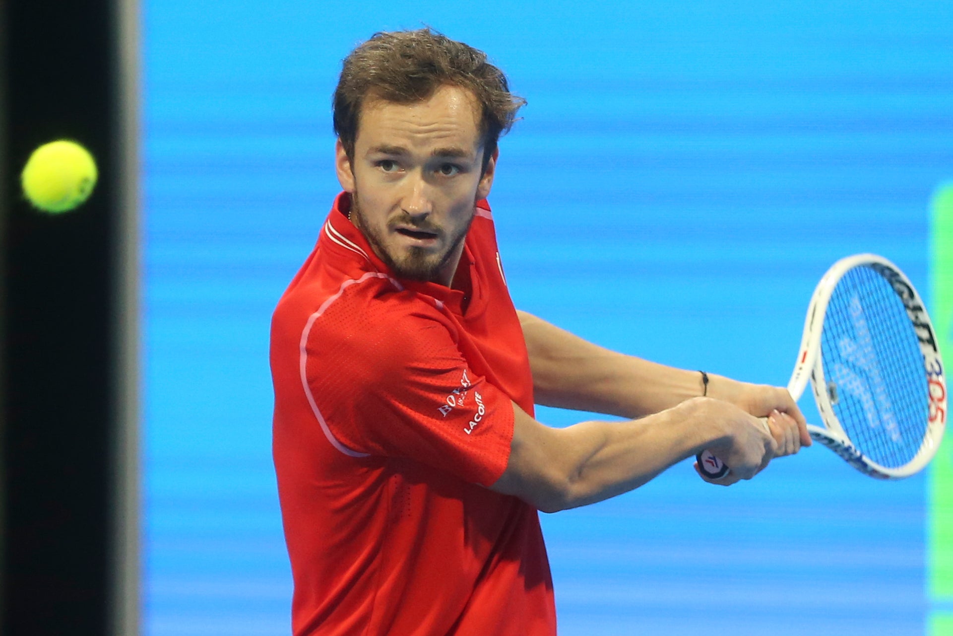 Daniel Medvedev of Russia returns to Andy Murray