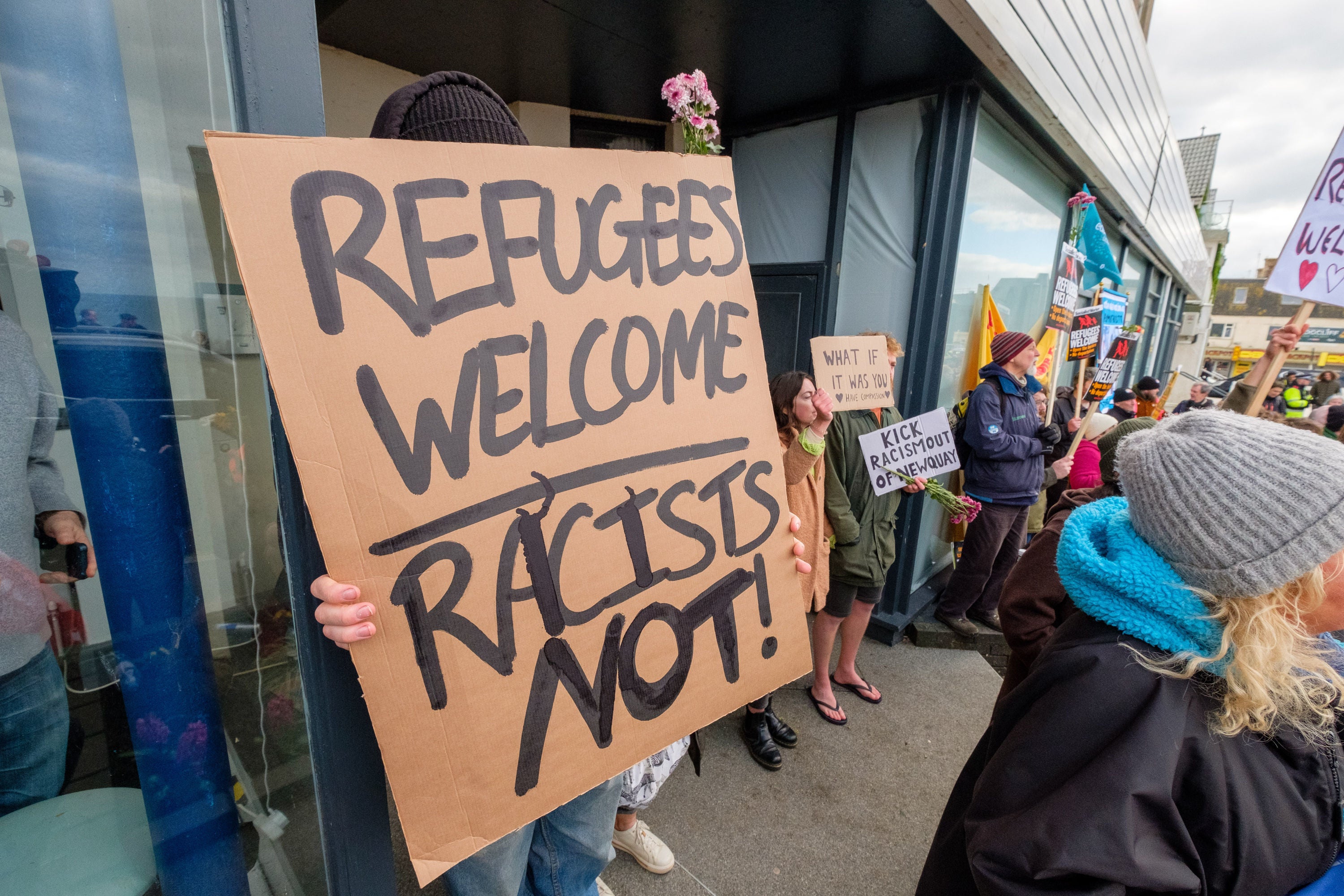 Anti-fascists at a protest by far-right activists outside a hotel used for asylum seekers