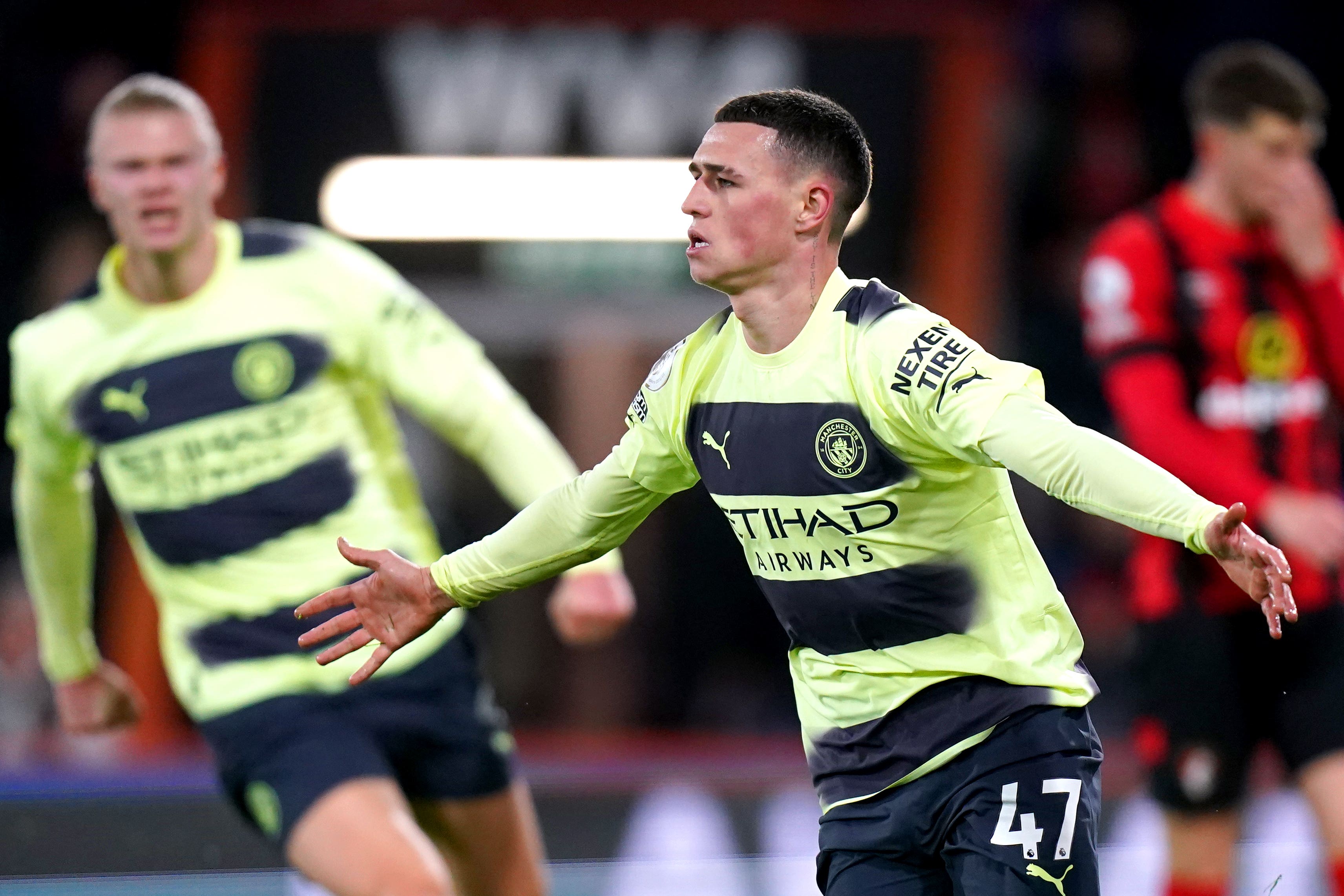 Phil Foden (right) scored Manchester City’s third as they breezed past Bournemouth (Adam Davy/PA)