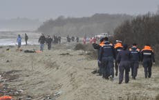 Dozens drown after refugee ship breaks apart in rough seas off Italian coast