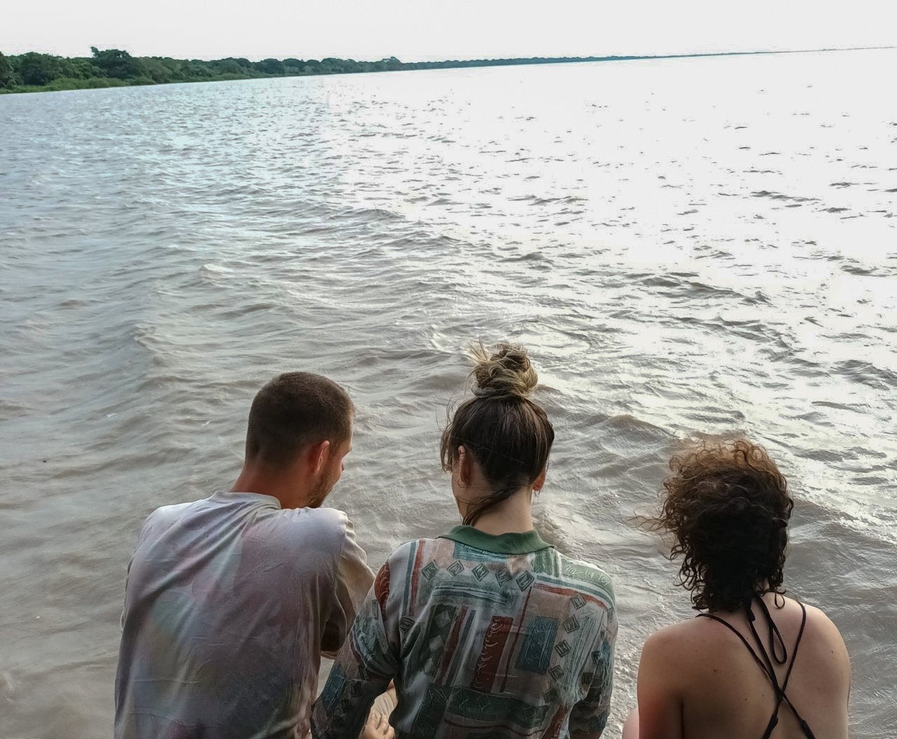 Claire Bye with friends at a river in Santa Rosa de Yacuma, Bolivia minutes before she was attacked by a dolphin