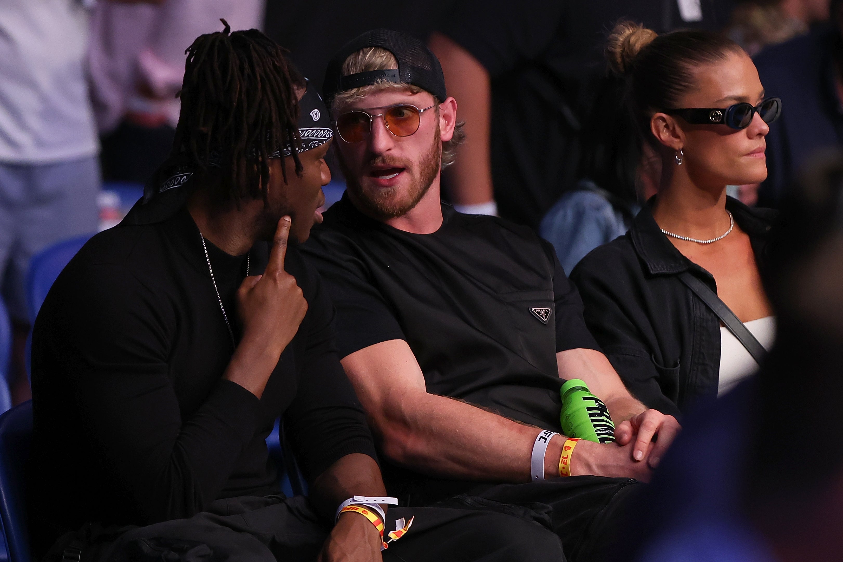 Jake Paul’s brother Logan (centre) has boxed Floyd Mayweather and now competes in WWE